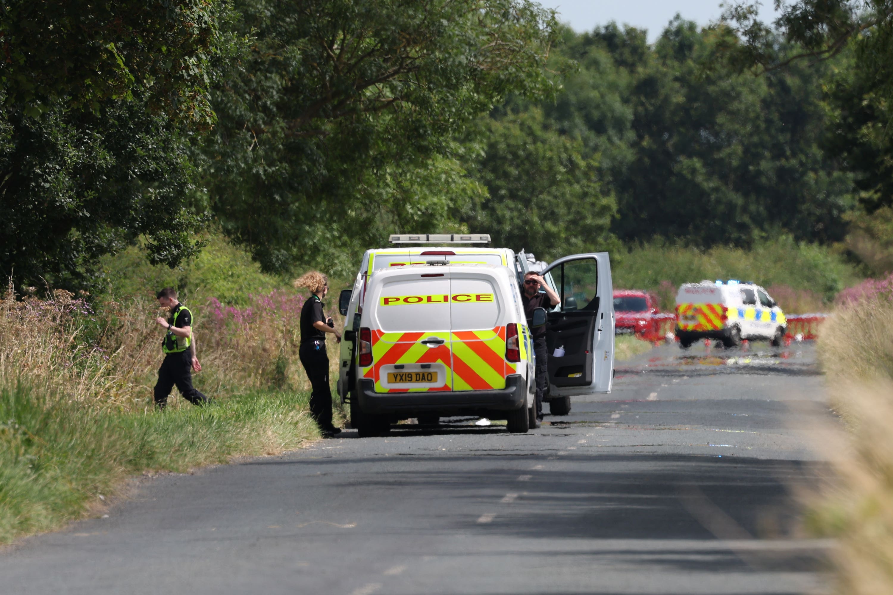 Police near to the scene of an incident involving a light aircraft at Thorganby near York (Nigel Roddis/PA)