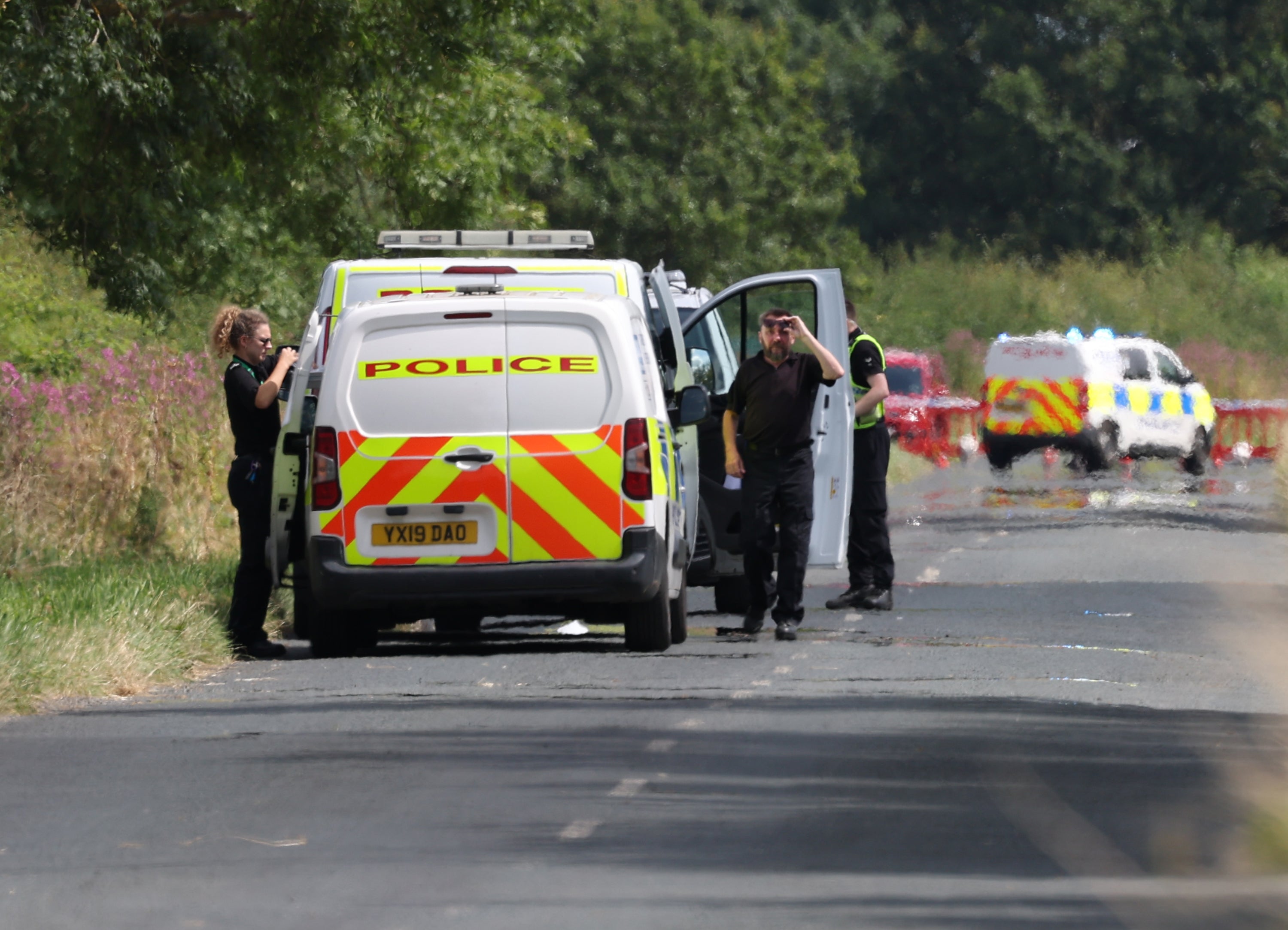 Police near to the scene of an incident involving a light aircraft at Thorganby near York, in North Yorkshire