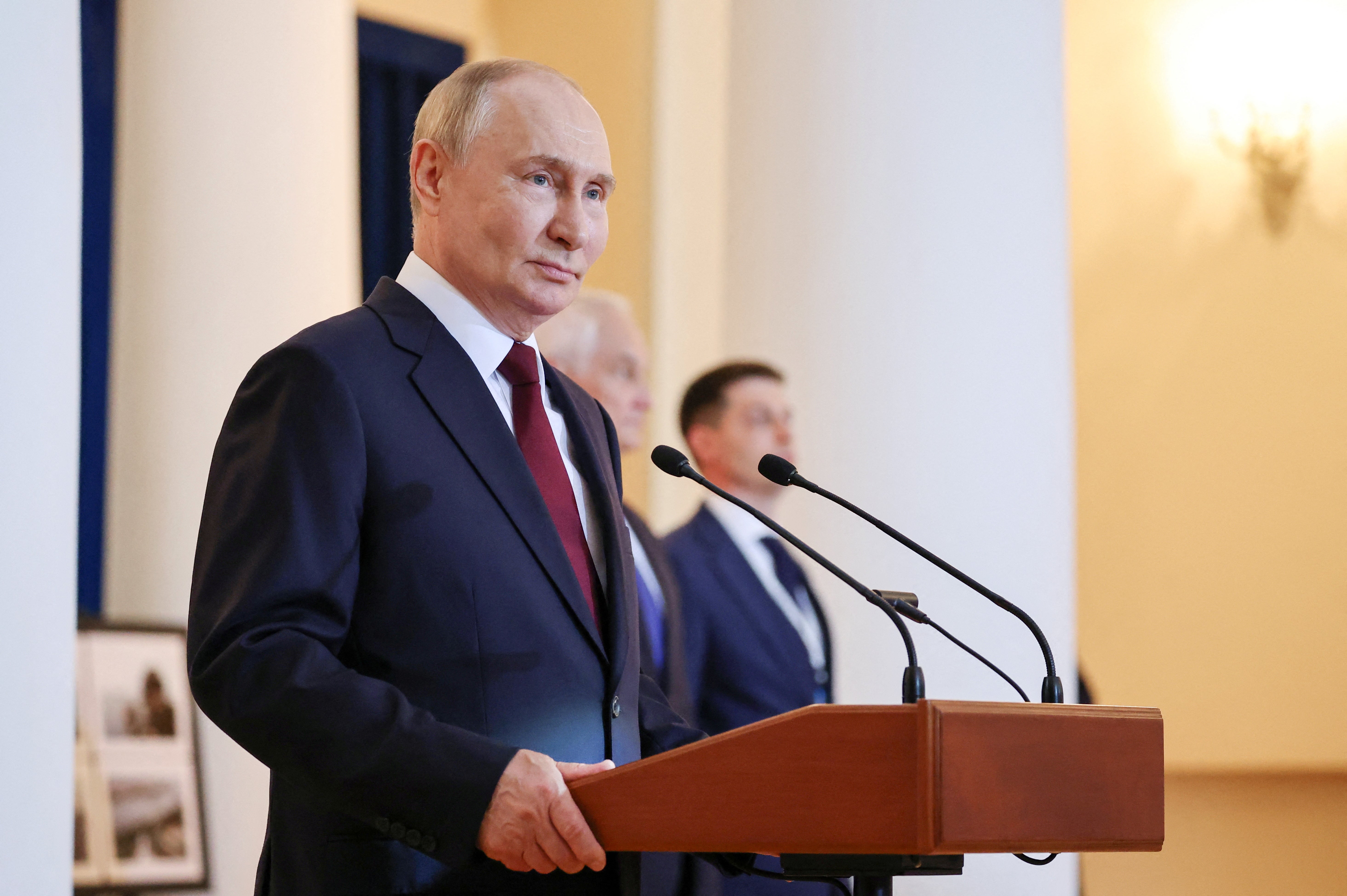 Russia's President Vladimir Putin delivers a speech during a meeting with sailors and heads of foreign delegations