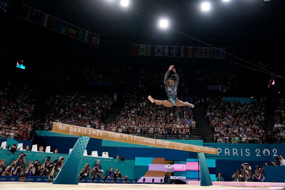 One Extraordinary Photo: Charlie Riedel captures Simone Biles in flight at the Paris Games