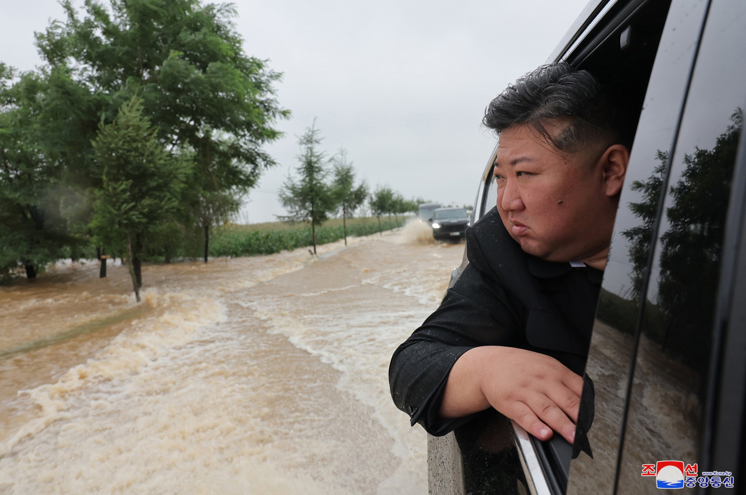 A photo released by the official North Korean Central News Agency (KCNA) shows North Korean leader Kim Jong Un inspecting a flood-hit area in North Phyongan Province, North Korea, 28 July 2024