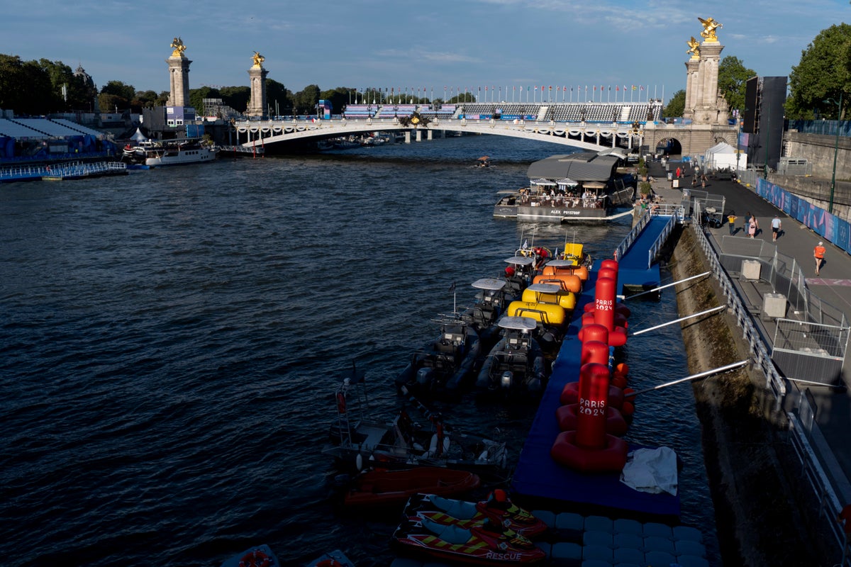 Watch live: Paris Olympics triathlon venue empty as River Seine pollution postpones men’s race