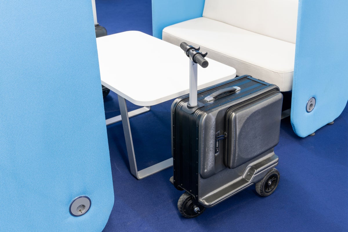 Japan says tourists will need driver’s licence to ride motorised electric suitcases   