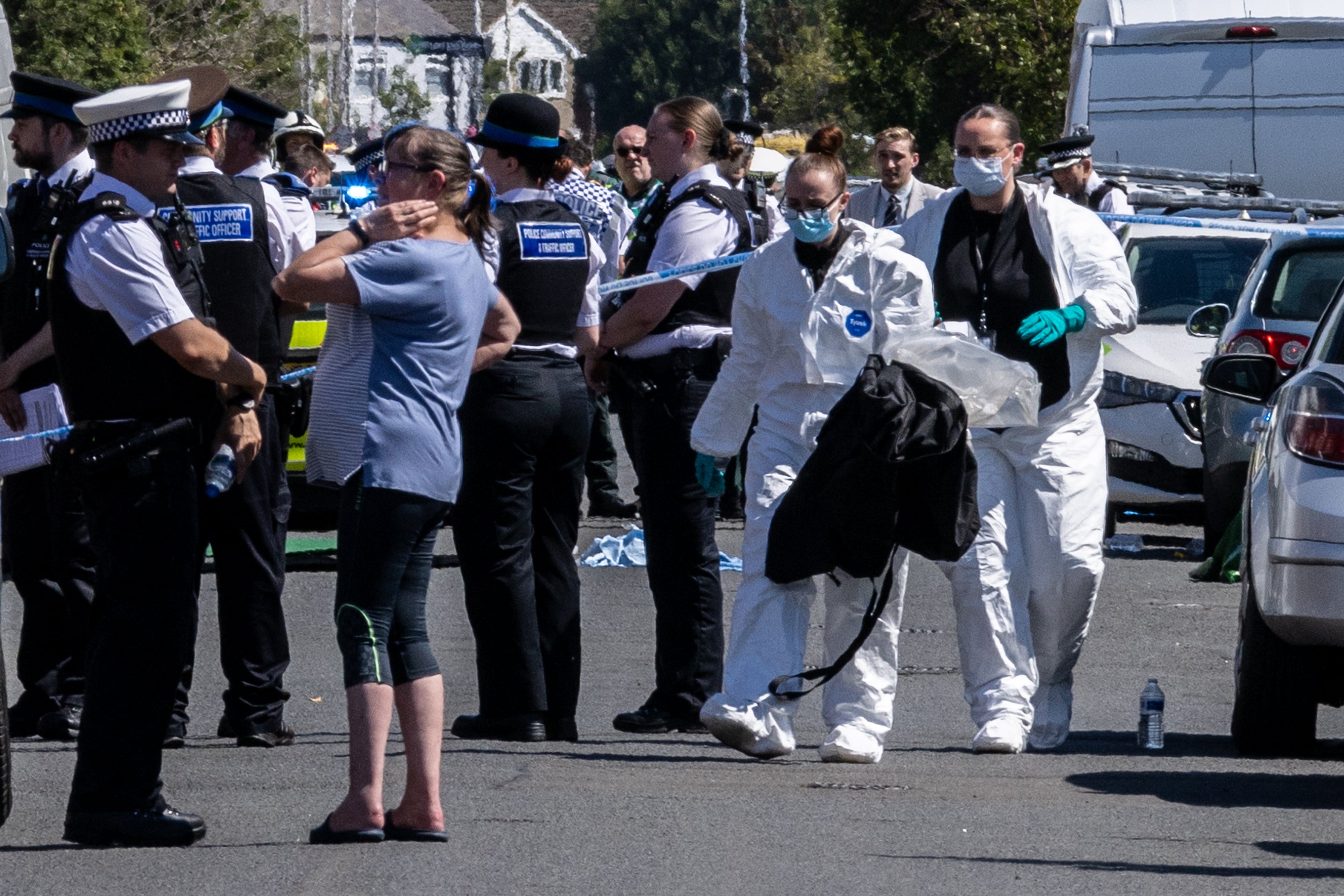 Eyewitnesses saw children with stab injuries running onto the road