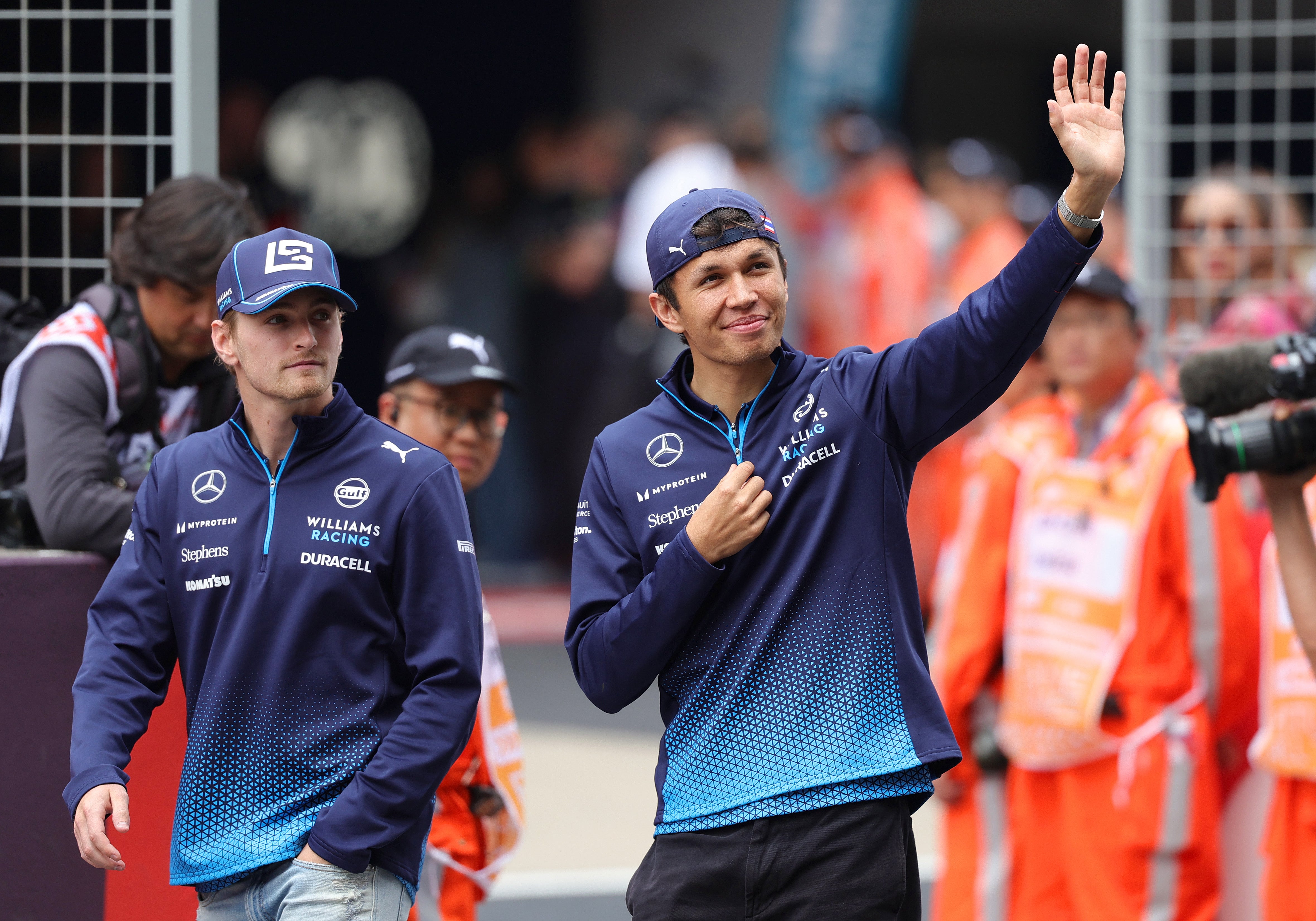 Sainz replaces Logan Sargeant (left) at Williams and will partner Alex Albon (right)