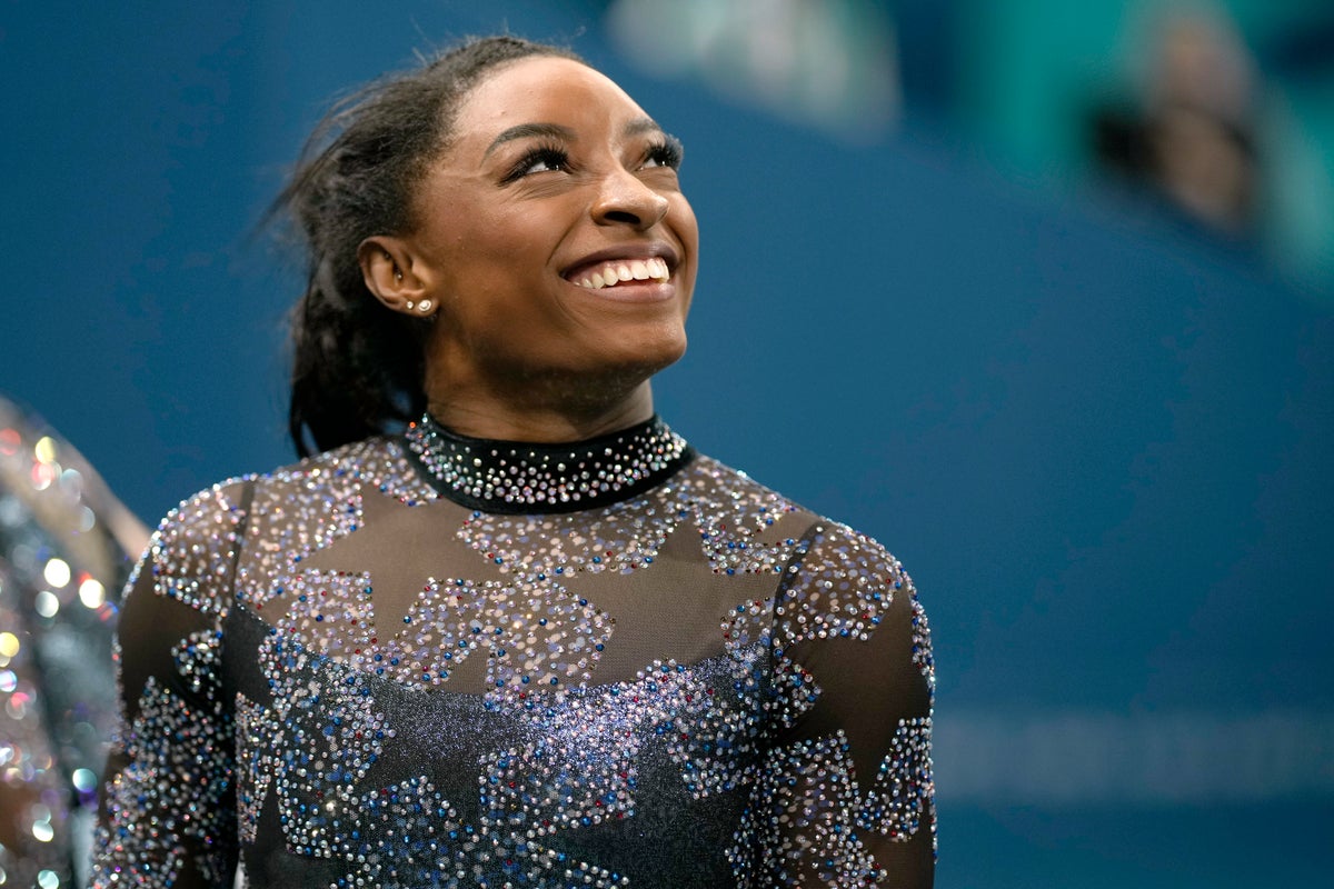 Simone Biles to compete on all four events despite calf injury during Olympic team finals