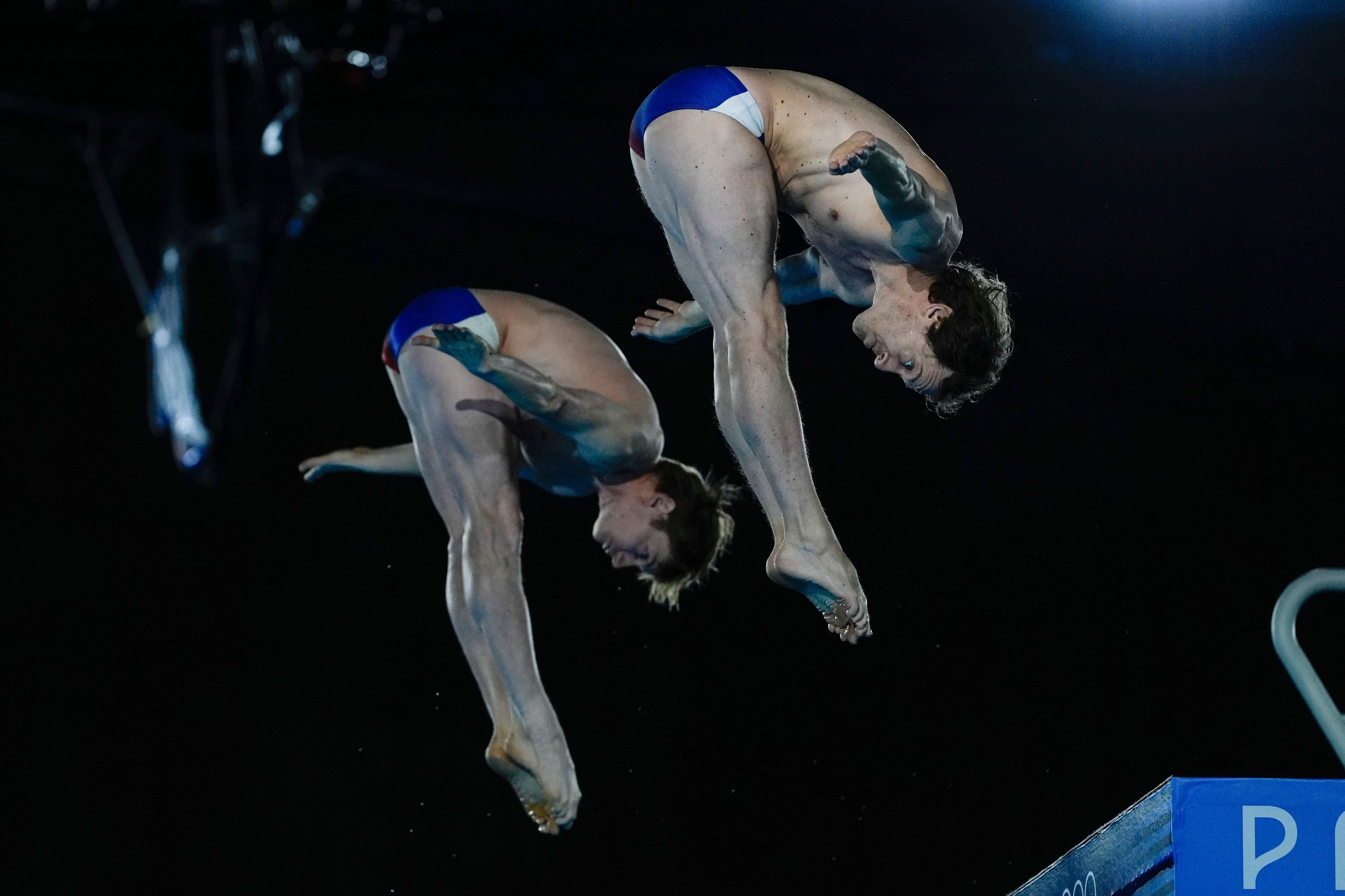 France’s Gary Hunt and Lois Szymczak compete in the men’s 10-metre synchro in Paris.