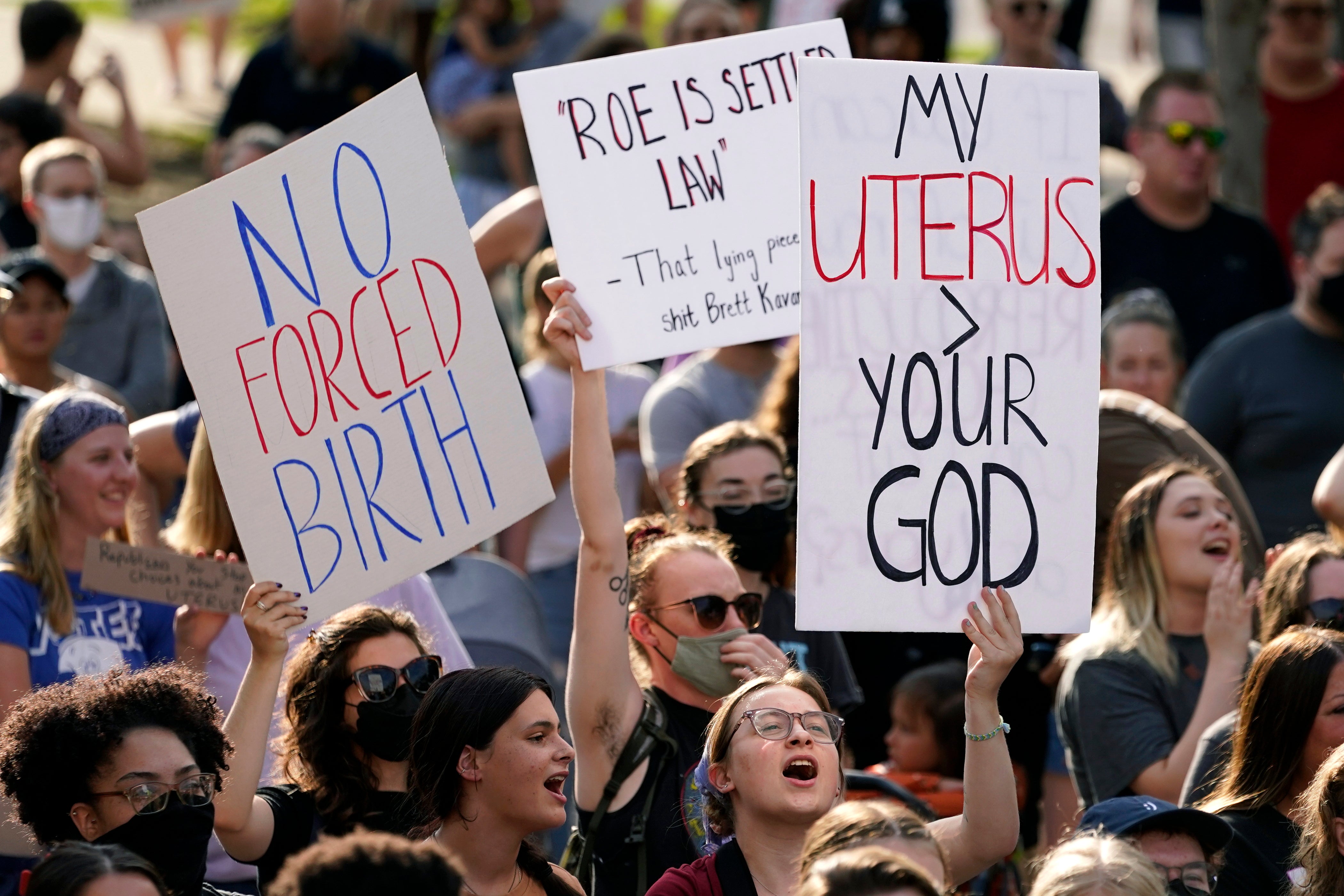 Abortion rights protestors in Iowa after the state outlawed abortions after six weeks of pregnancy