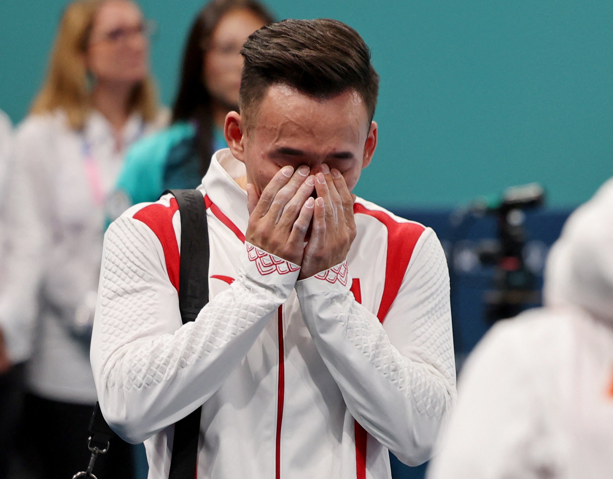 Ruoteng Xiao of China is devastated after finishing second