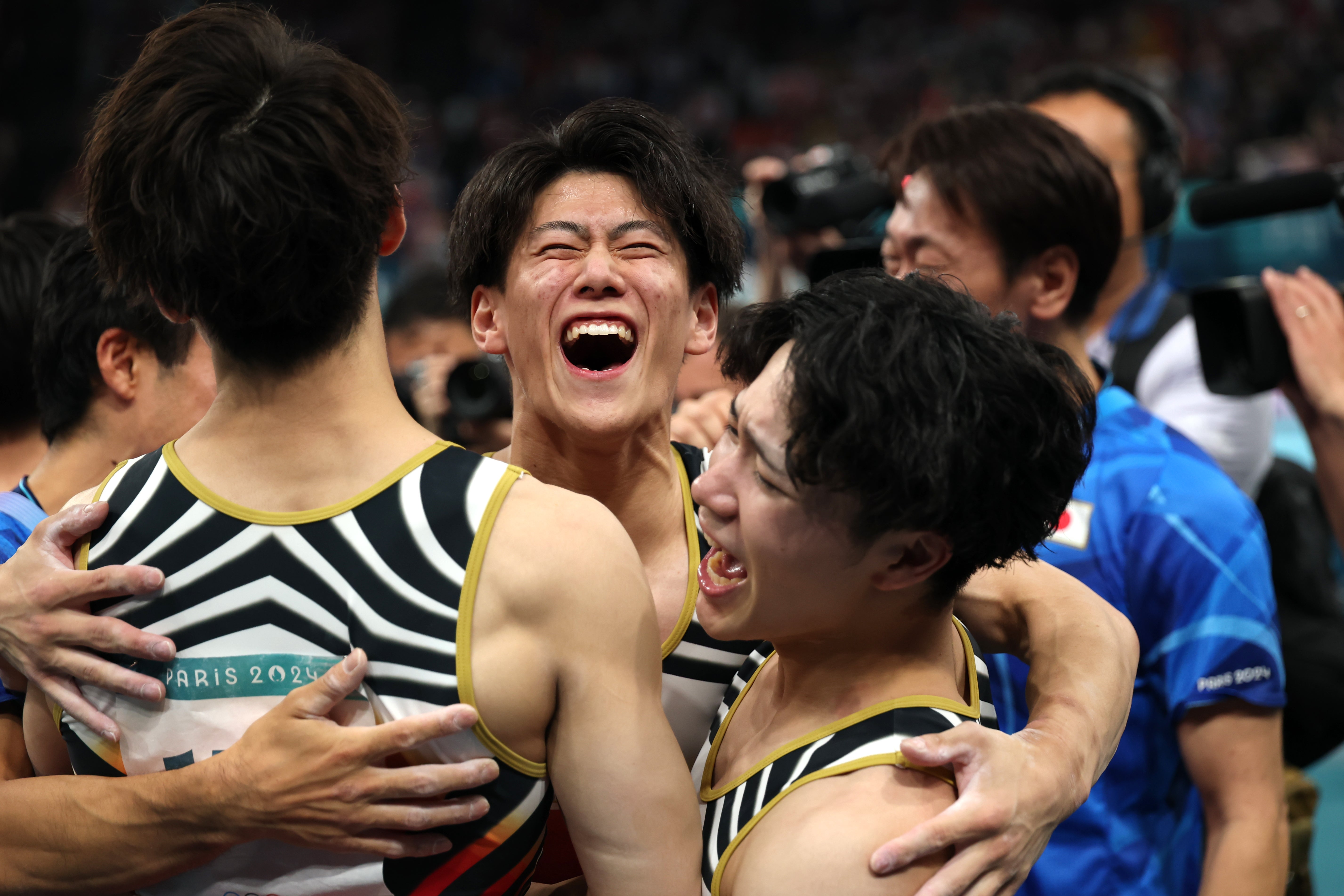 Daiki Hashimoto of Japan celebrates after a thrilling gymnastics team final