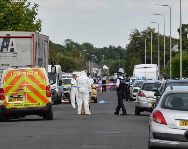 <p>Emergency services on Hart Street in Southport on Monday </p>