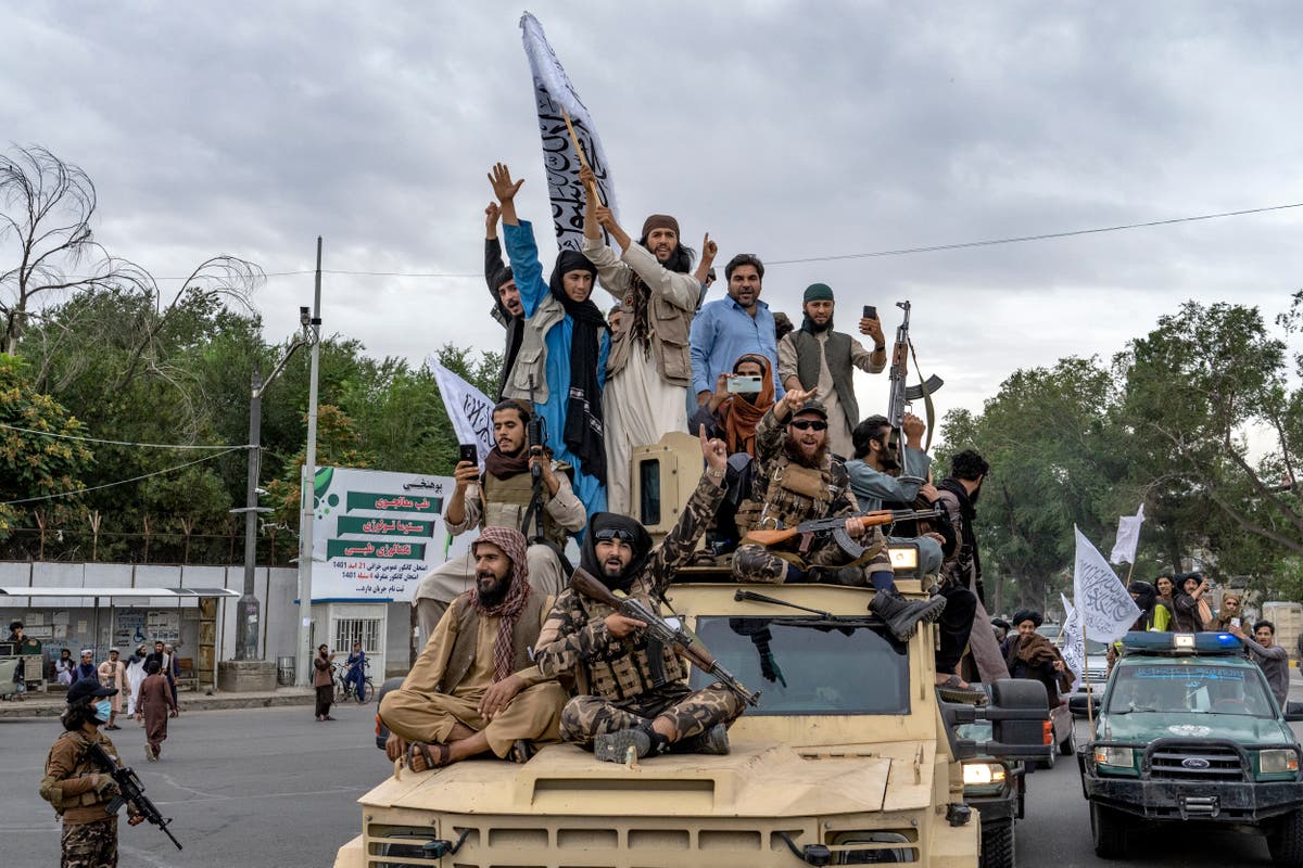 The Taliban says foreigners in Afghanistan on previous government's visas can stay for now