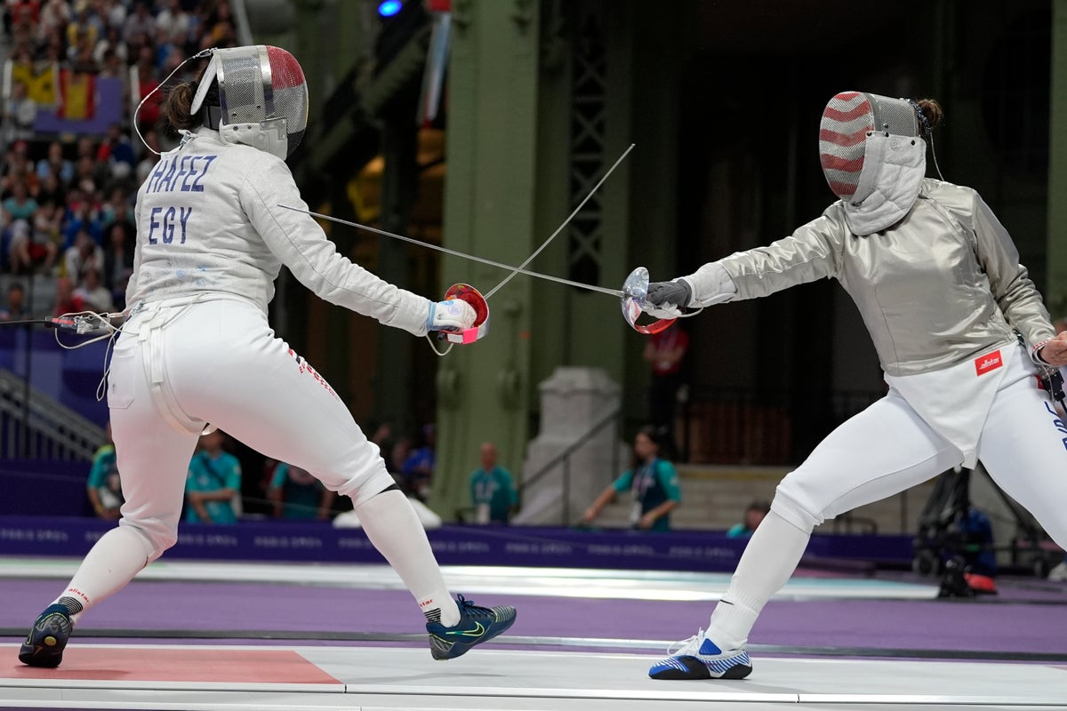 Fans applaud fencer Nada Hafez after she competed in Olympics while seven months pregnant