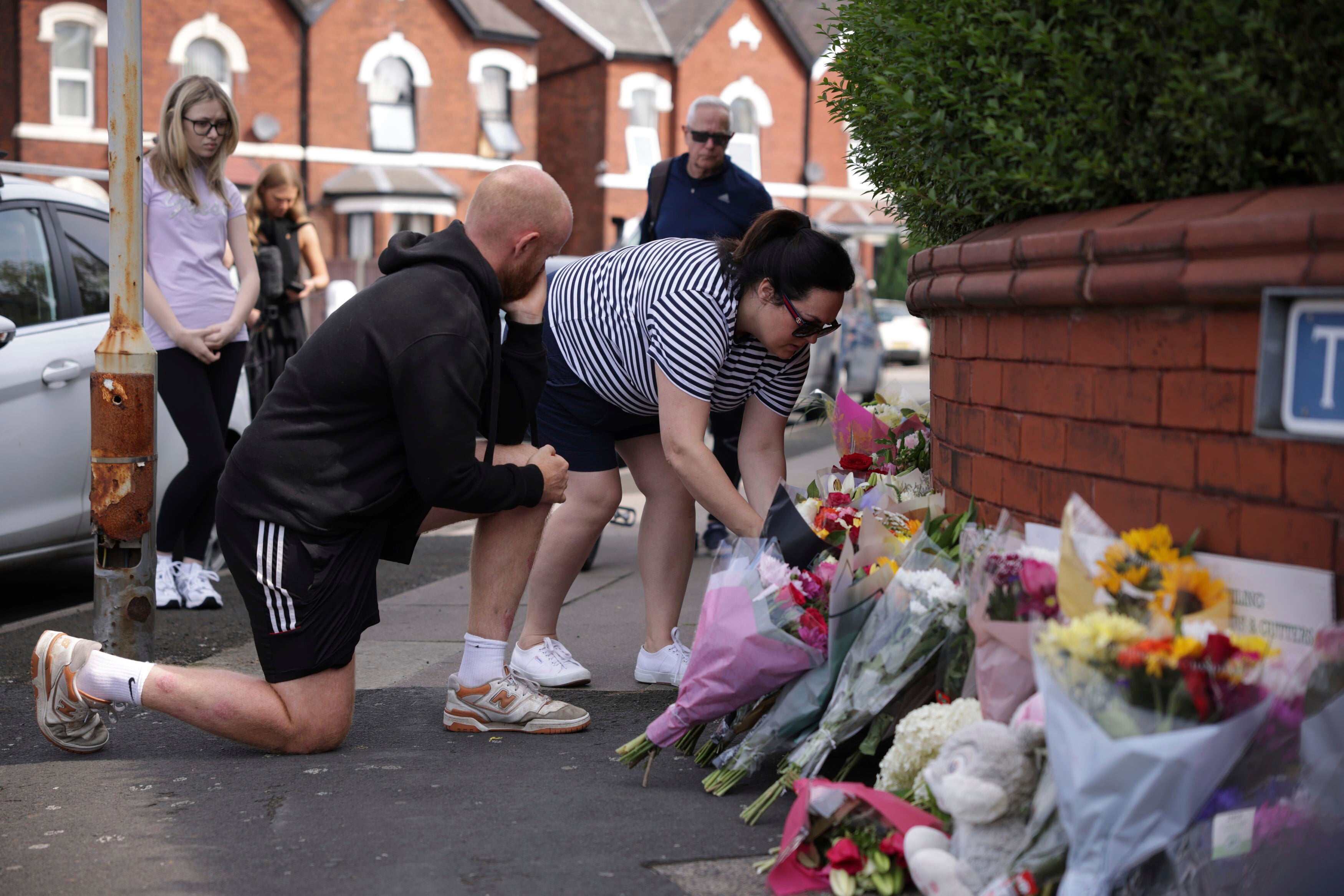 People leave tributes in Hart Street