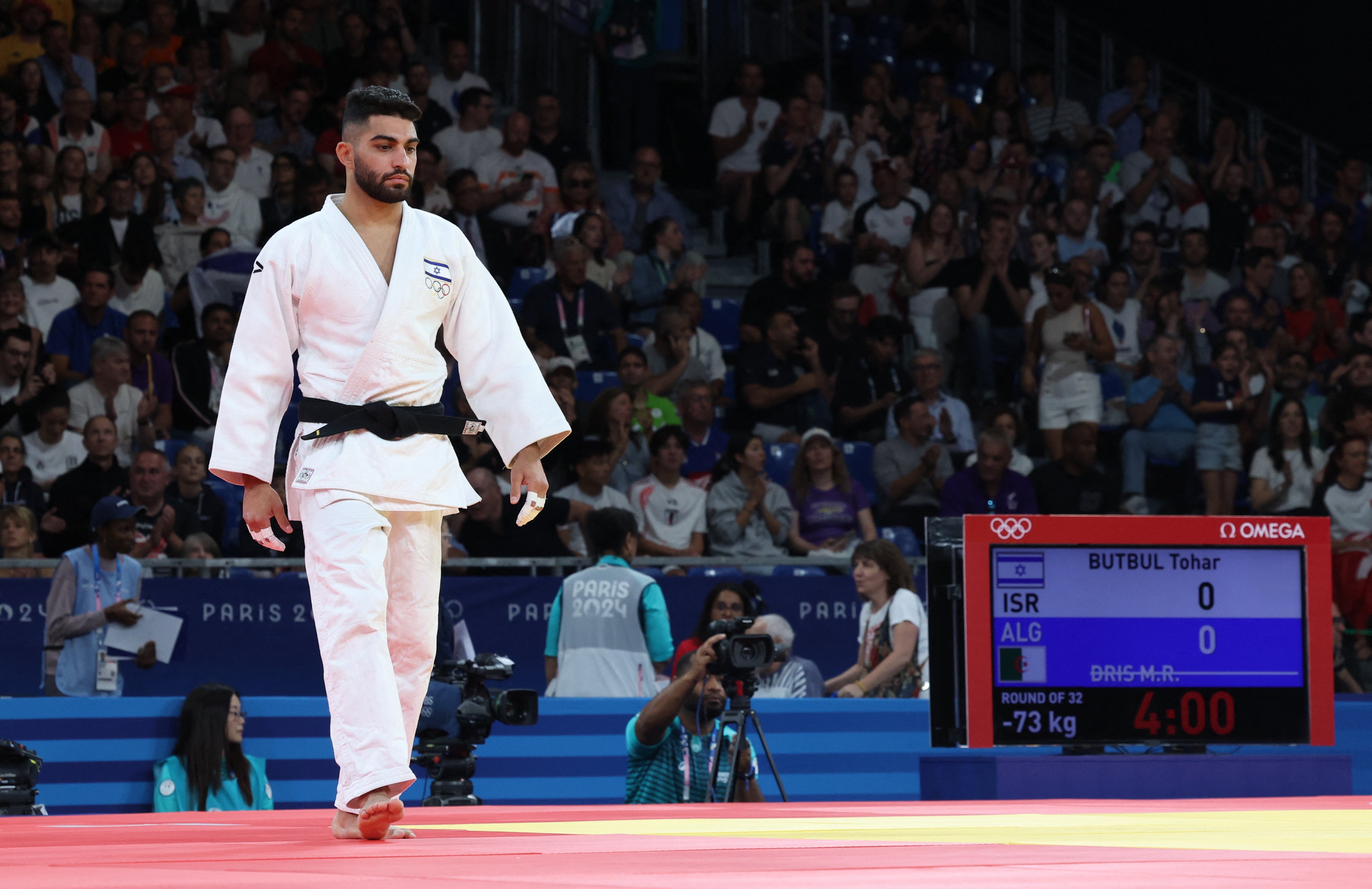 Israel’s Tohar Butbul appeared but his opponent, Messaoud Redouane Dris of Algeria, did not