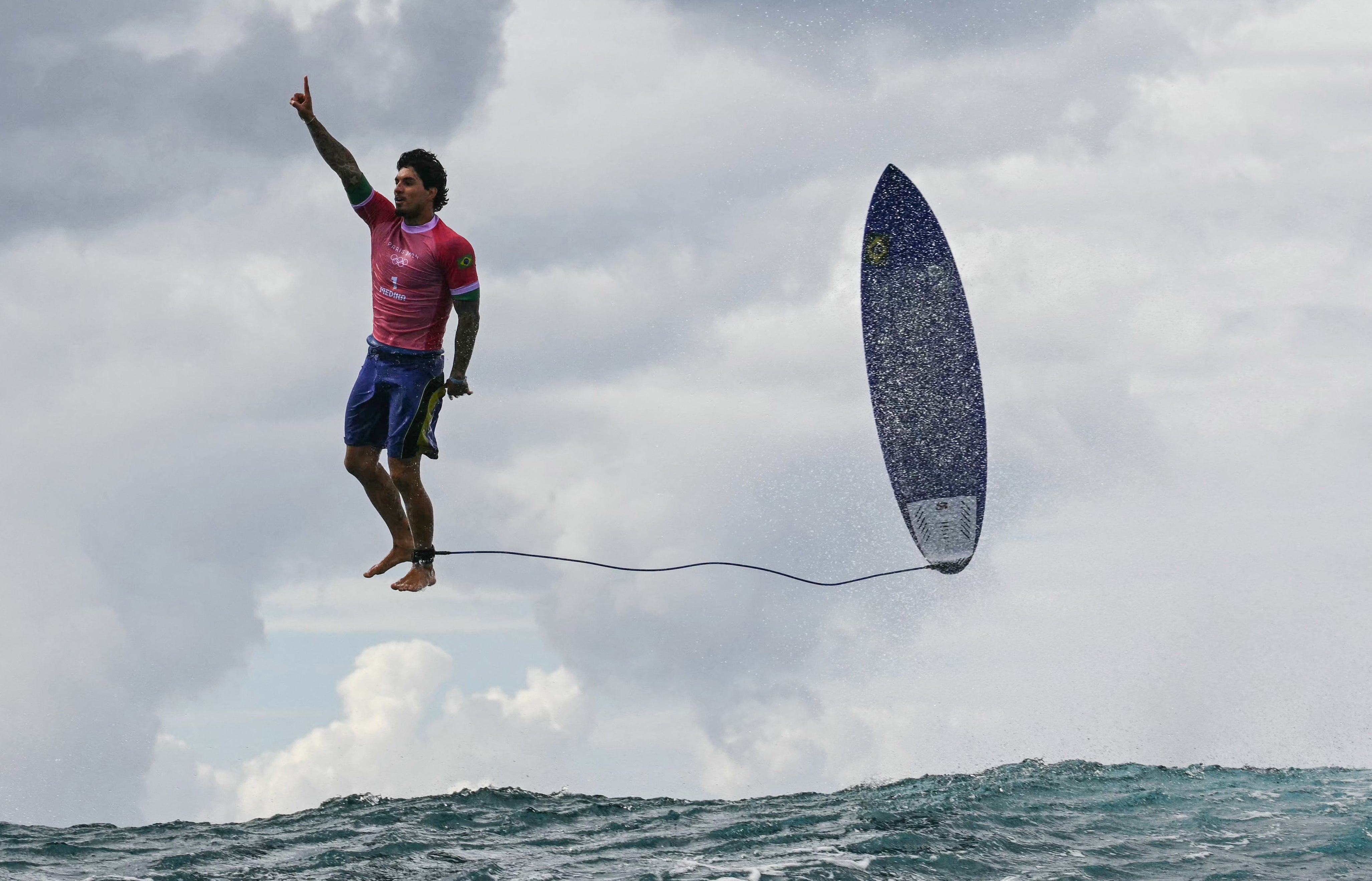 The famous shot of Gabriel Medina competing at Paris 2024 Olympics in Teahupo’o.