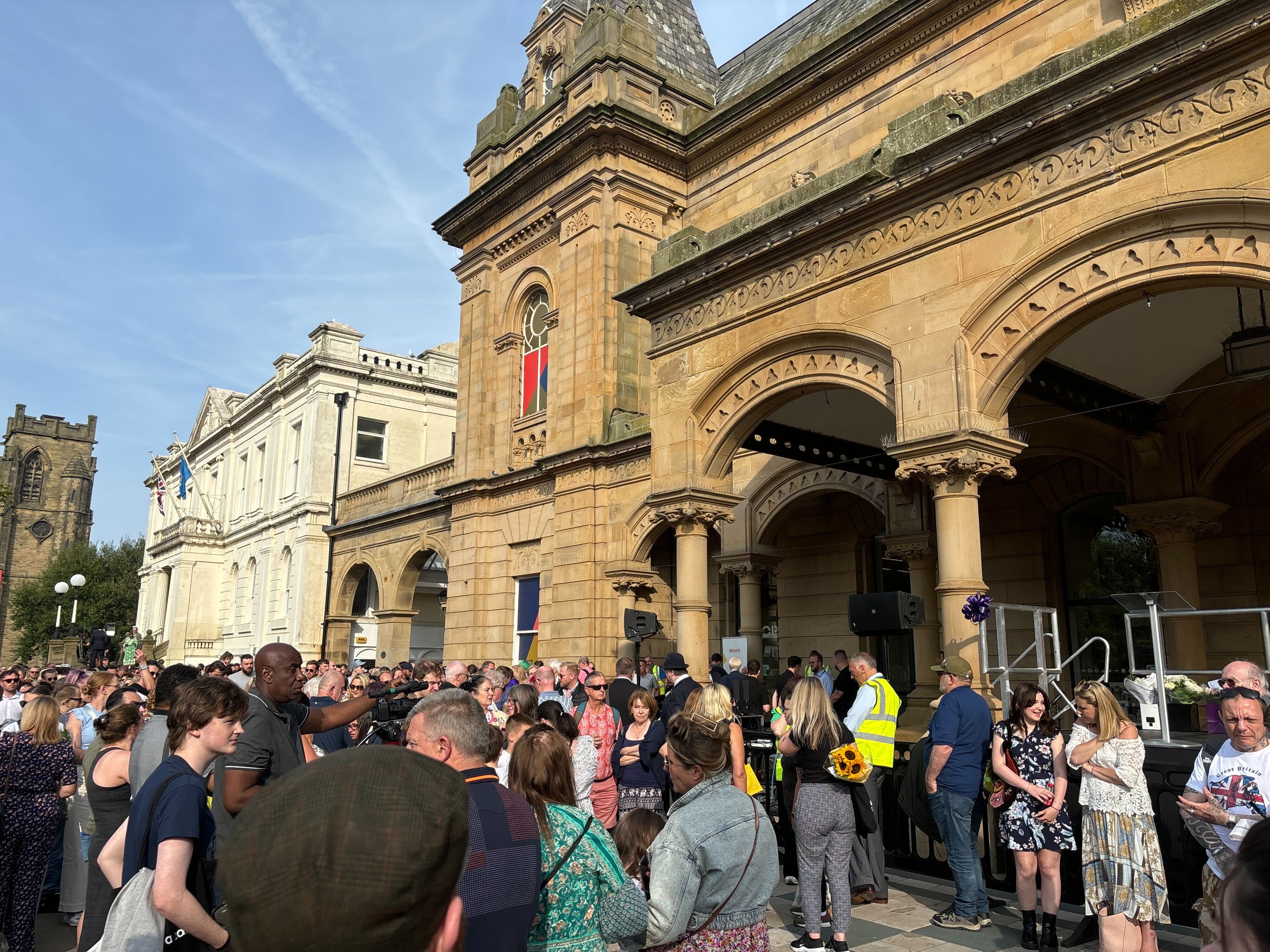 A vigil to commemorate the victims is held in Southport