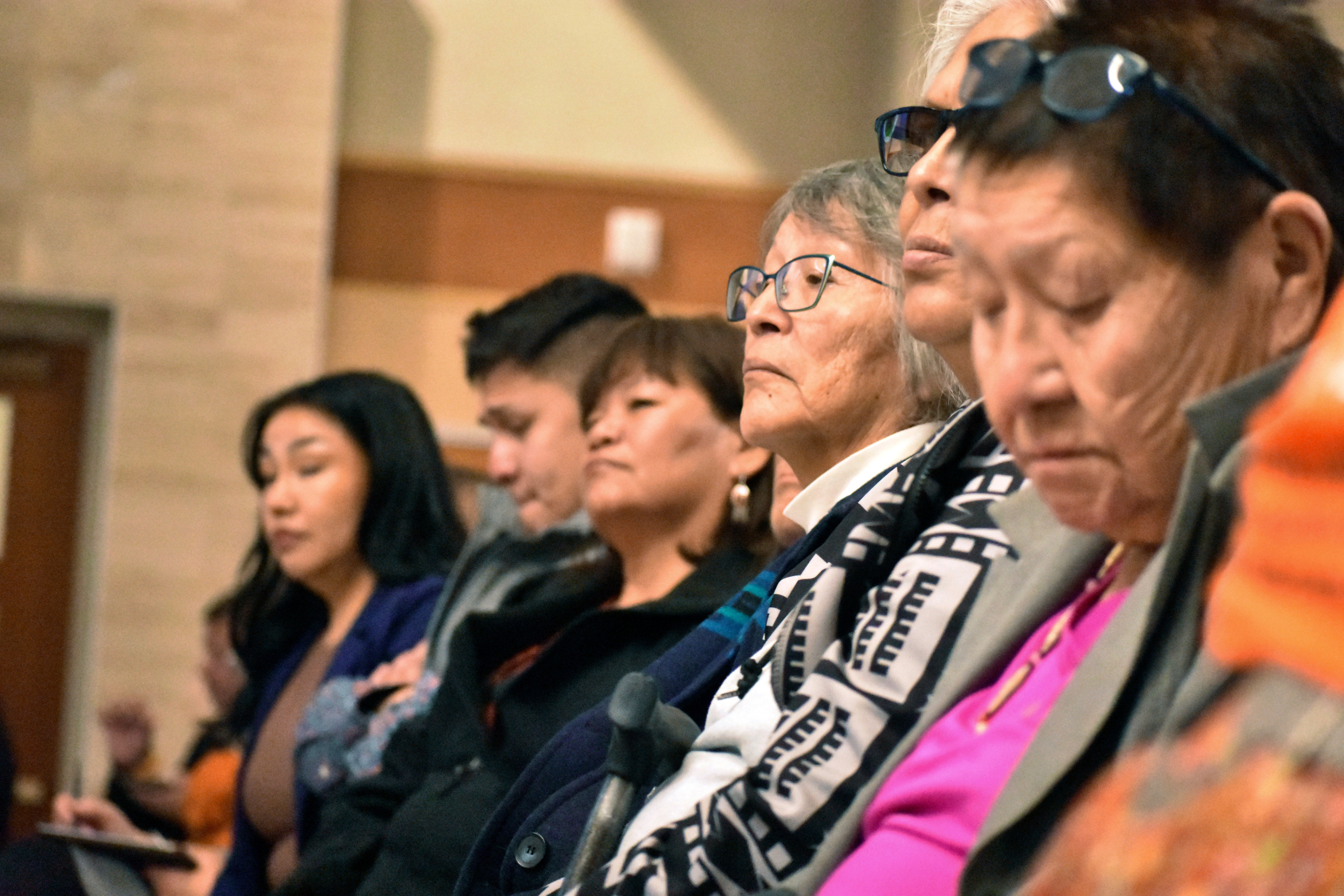 Elders from the Northern Cheyenne Tribe in southeastern Montana listen to speakers during a session for survivors