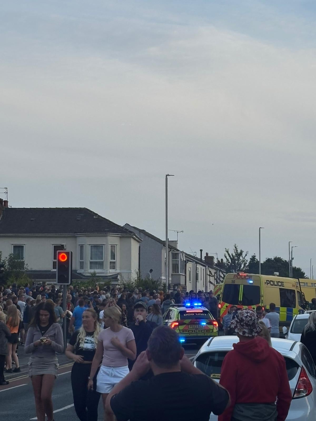 Police officers are believed to have suffered minor injuries as chaos unfolds near crime scene