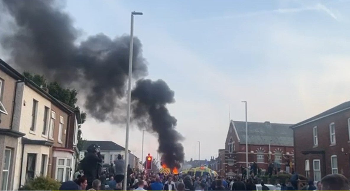 Police van set on fire amid chaotic scenes in Southport