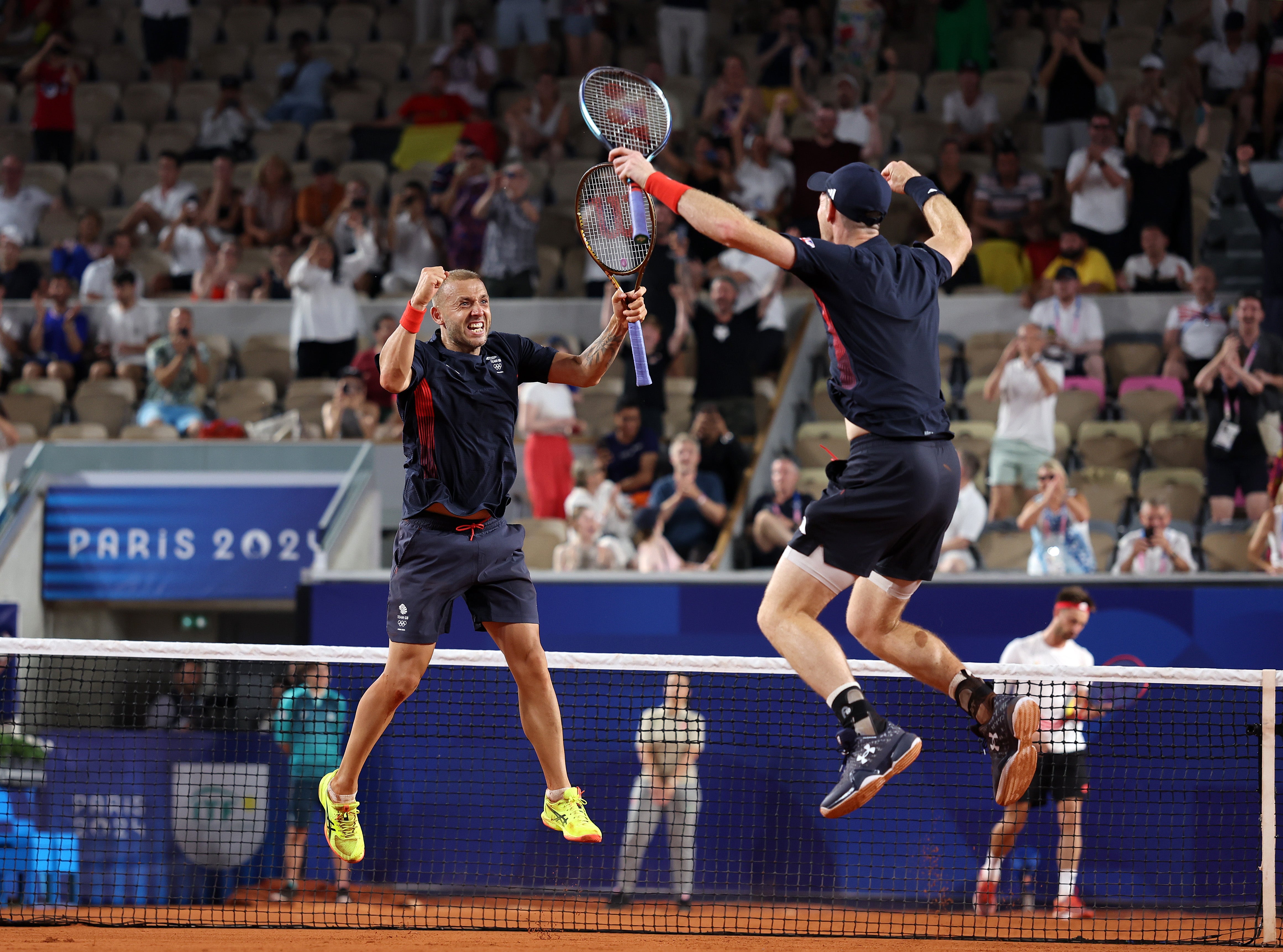 Murray and Evans leap as they celebrate another thrilling victory