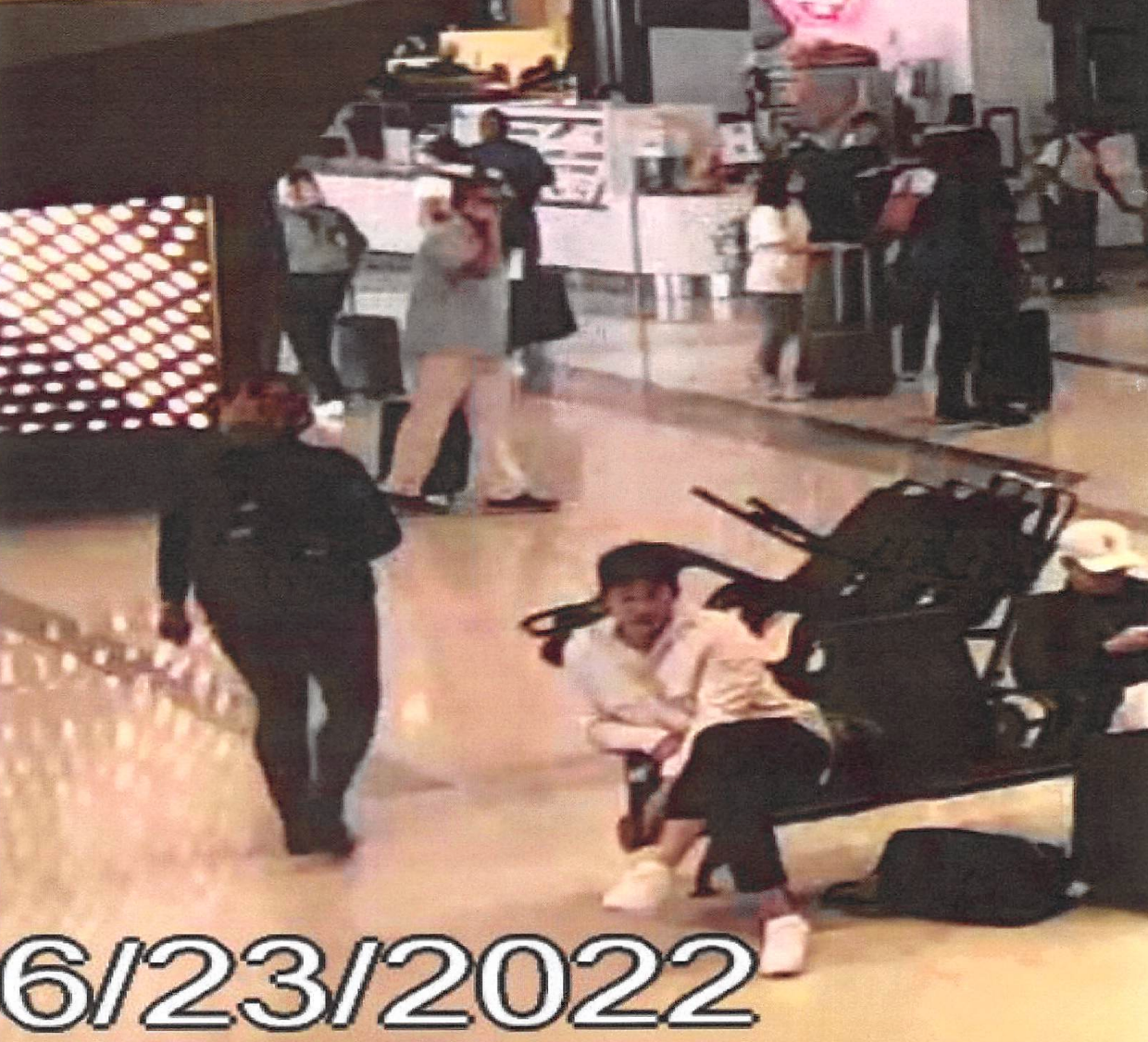 Brian Patrick Durning (in the teal shirt) continued to stalk his teenage victim in the airport after their flight, according to court filings. He was found guilty in June 2023 of assaulting a minor aboard an aircraft and sentenced to five years in federal prison