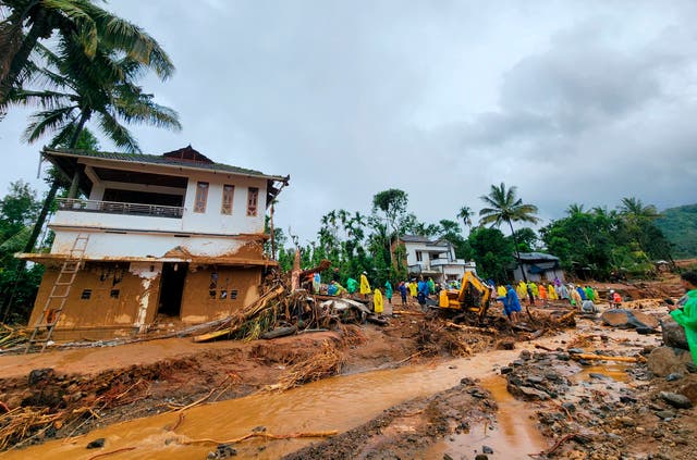 <p>Rescue workers at one of the villages hit by landslides in Wayanad district of Kerala, southern India</p>