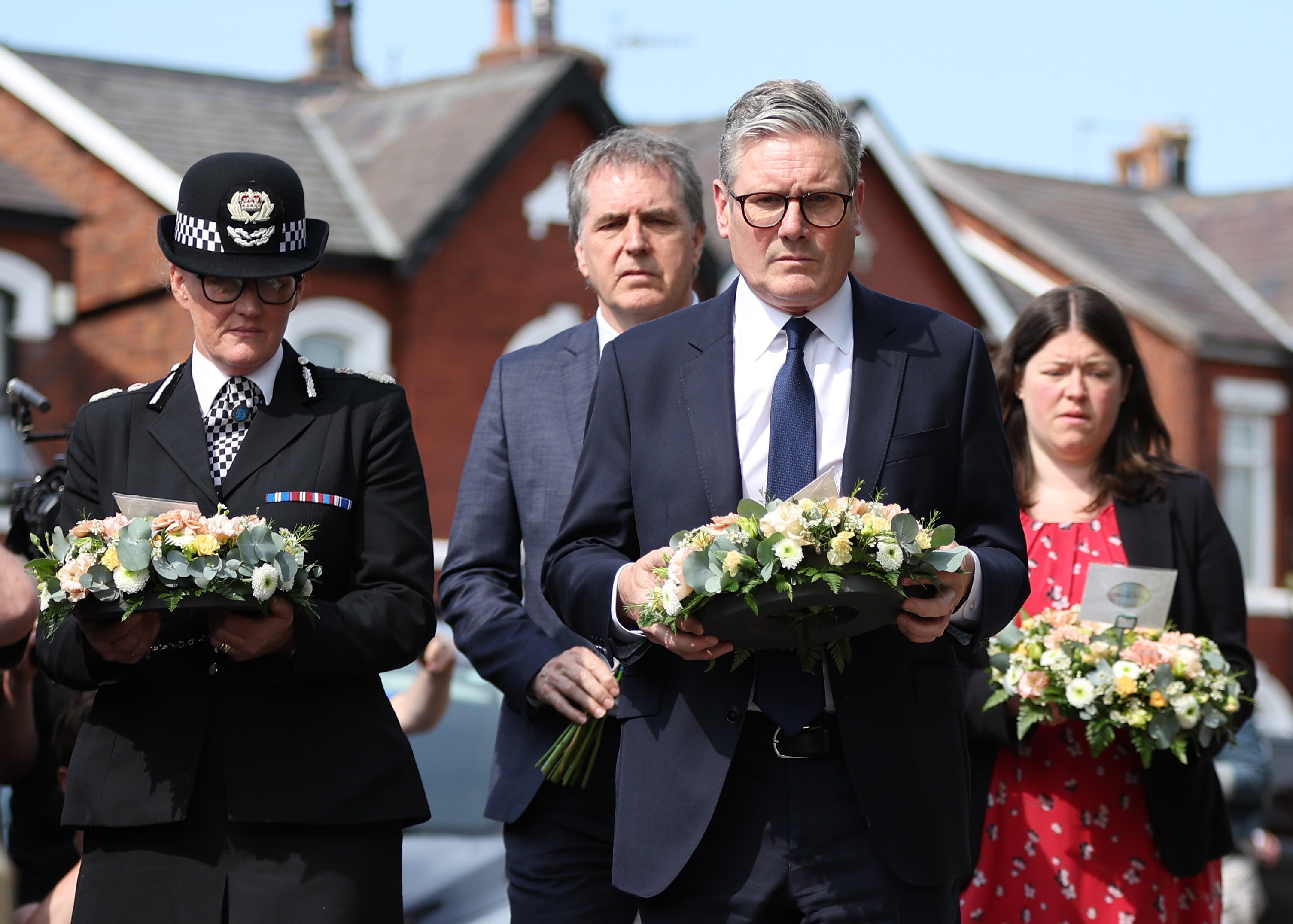 The prime minister arriving to lay flowers at the scene of a stabbing attack on Hart Street in Southport