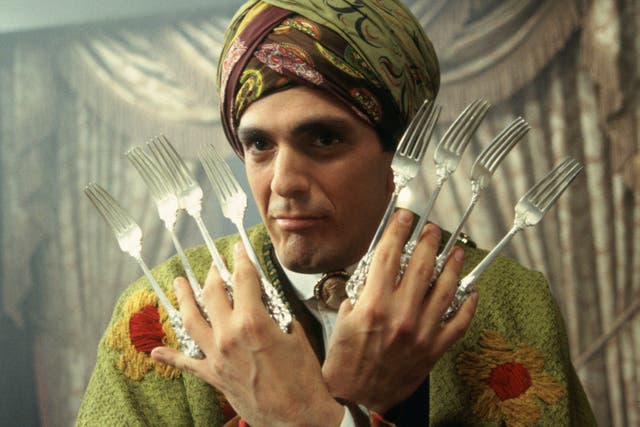 <p>Utterly cutlery: Hank Azaria wields forks as crime-fighter the Blue Raja in ‘Mystery Men’ </p>