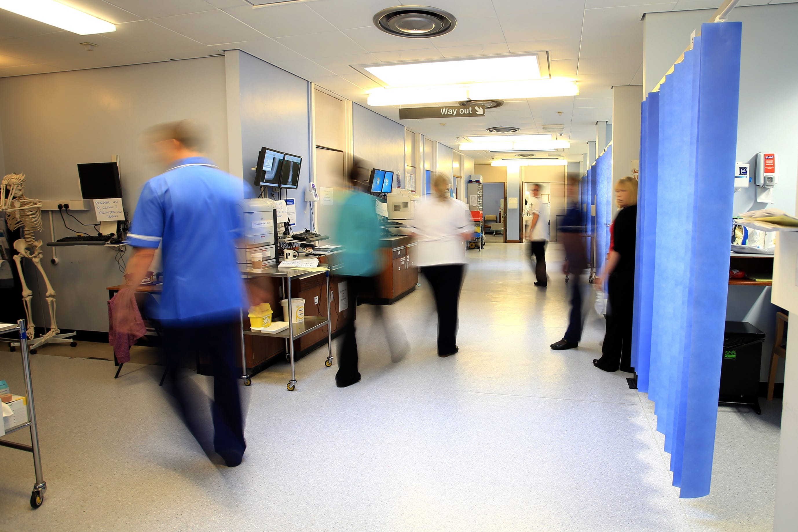 File photo dated 03/10/14 of staff on a NHS hospital ward.