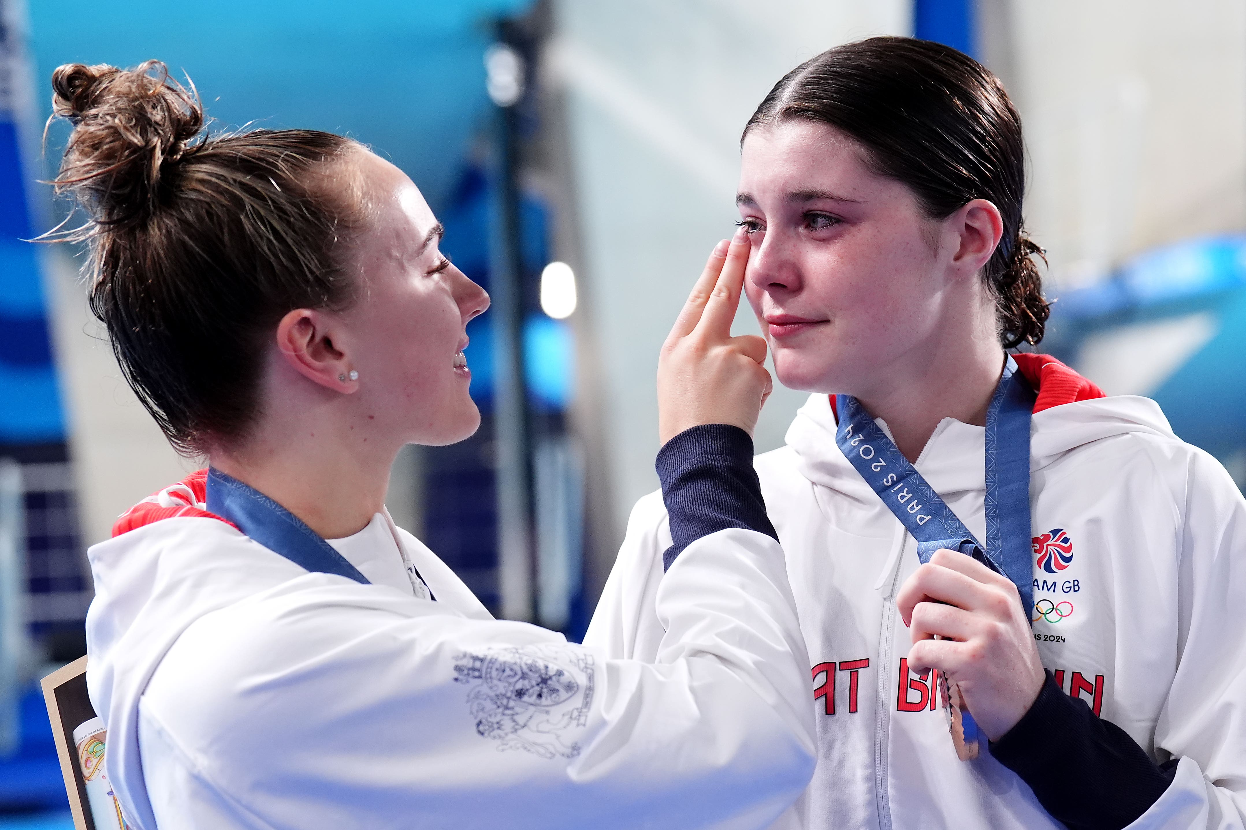 Great Britain’s Lois Toulson wipes a tear from Andrea Spendolini-Sirieix after they received their bronze medal (John Walton, PA)