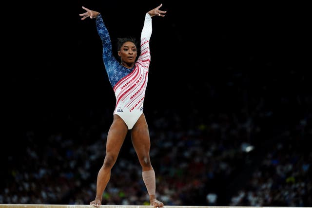 Simone Biles reigned supreme as the US eased to the women’s team gymnastics title (Mike Egerton/PA)