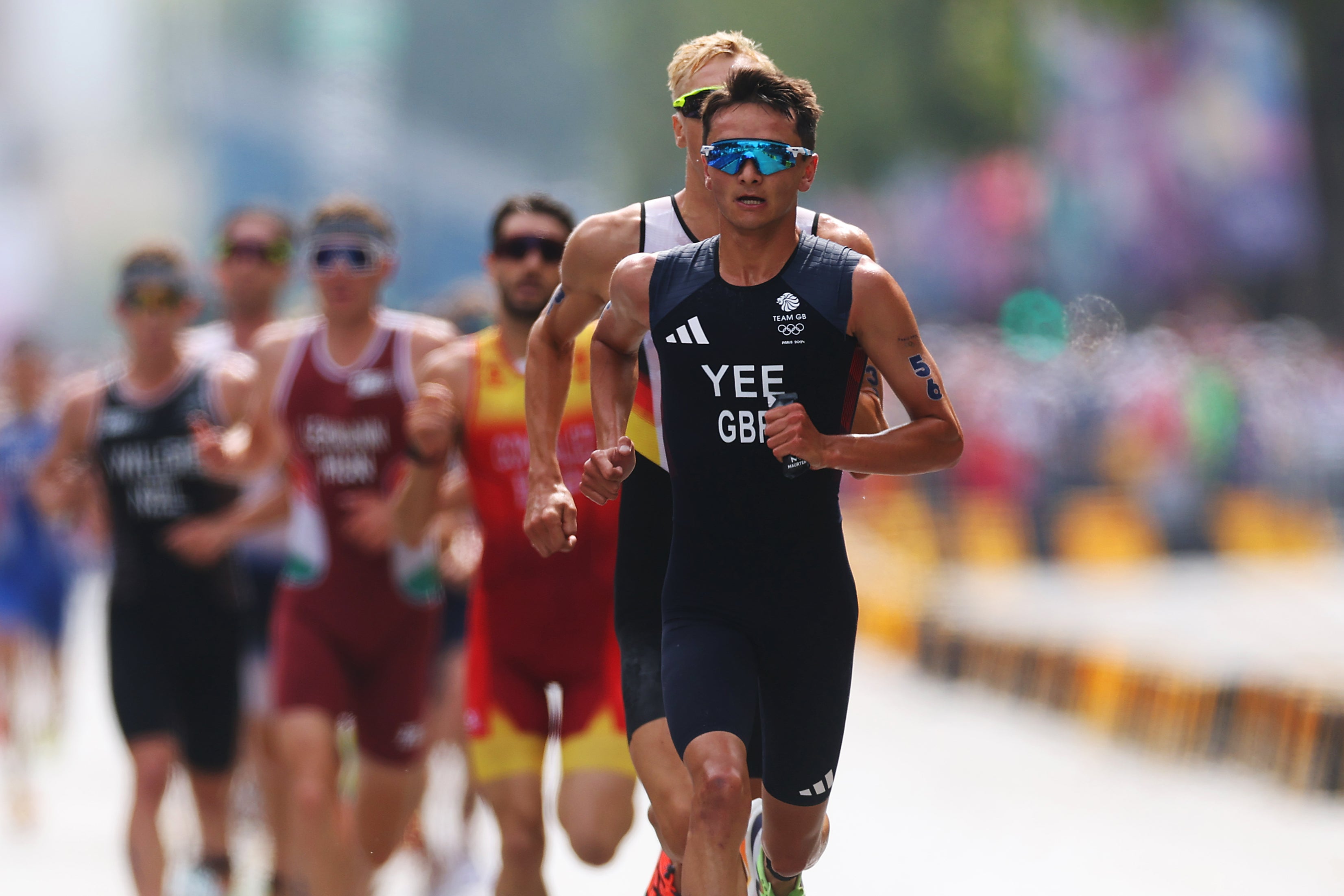 Yee in action during the running leg of the triathlon