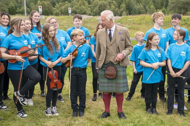 Charles met members of the Feis air an Oir community music group during his visit to the Forsinard Flows Visitor Centre