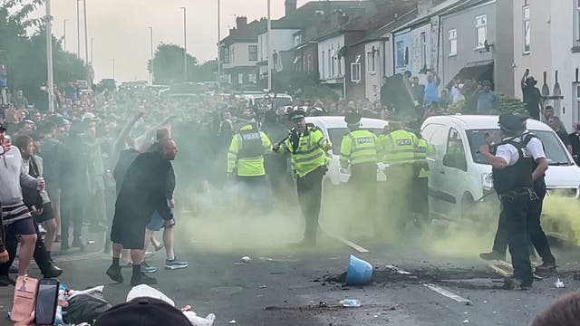 <p>Clashes between protesters and the police flared on Tuesday in Southport</p>