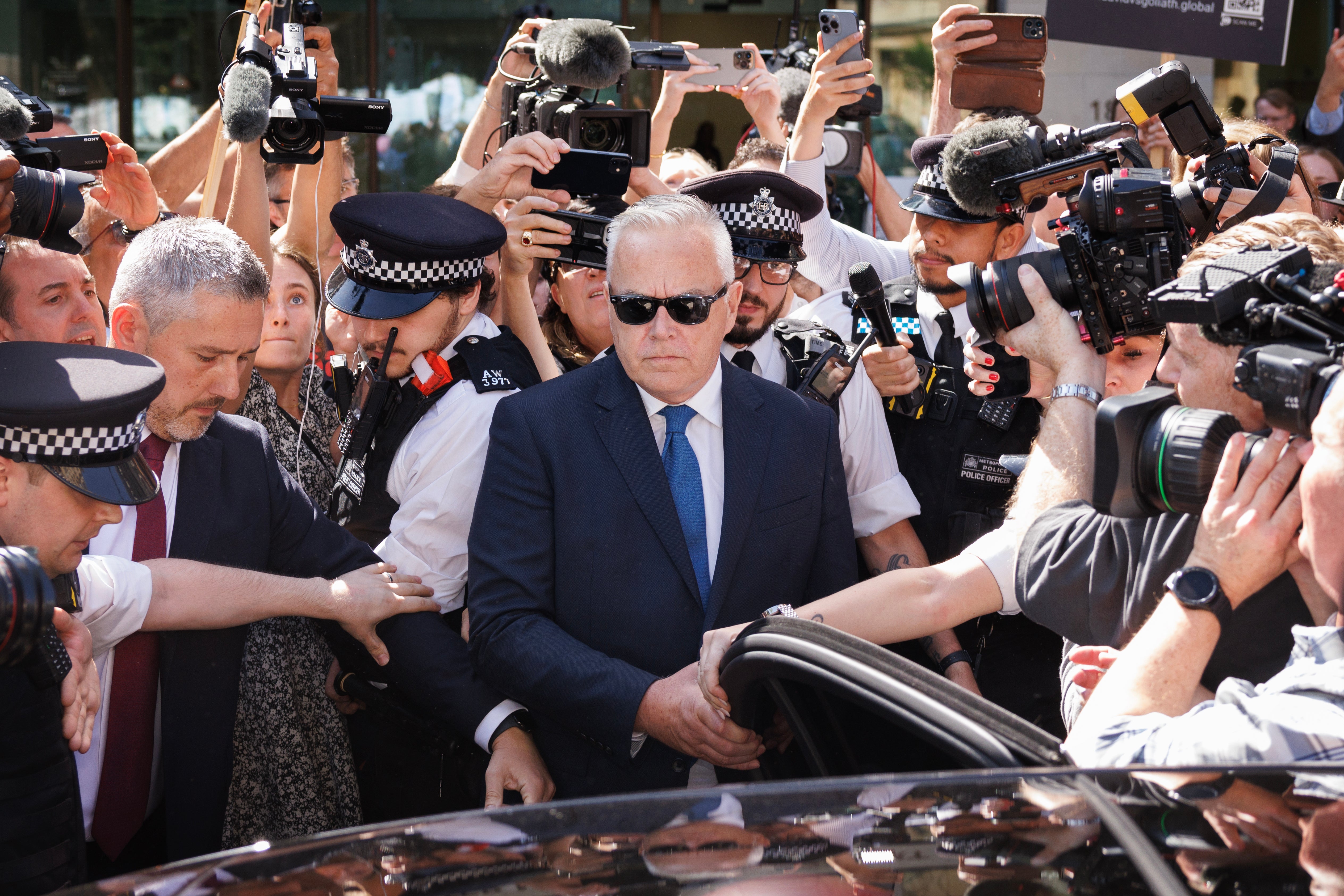 Broadcaster Huw Edwards leaves Westminster Magistrates’ Court on July 31