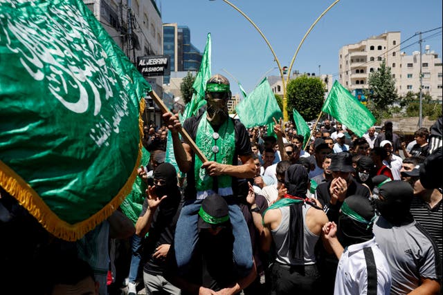 <p>Palestinians attend a protest after the assassination of Hamas leader Ismail Haniyeh in the occupied West Bank</p>