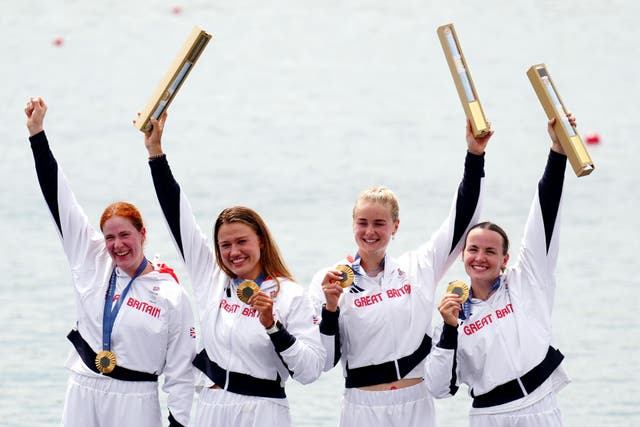 Great Britain’s Lauren Henry, Hannah Scott, Lola Anderson and Georgie Brayshaw celebrate with their rowing gold medals (Mike Egerton/PA)