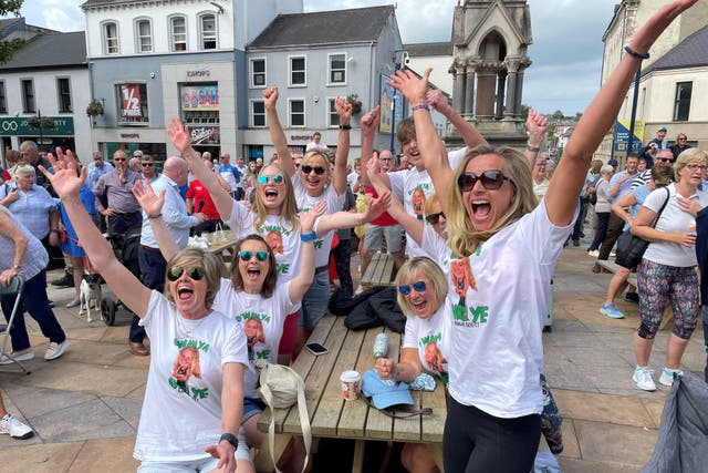 People in the centre of Coleraine in Northern Ireland at an Olympic big screen watch-along event (PA)