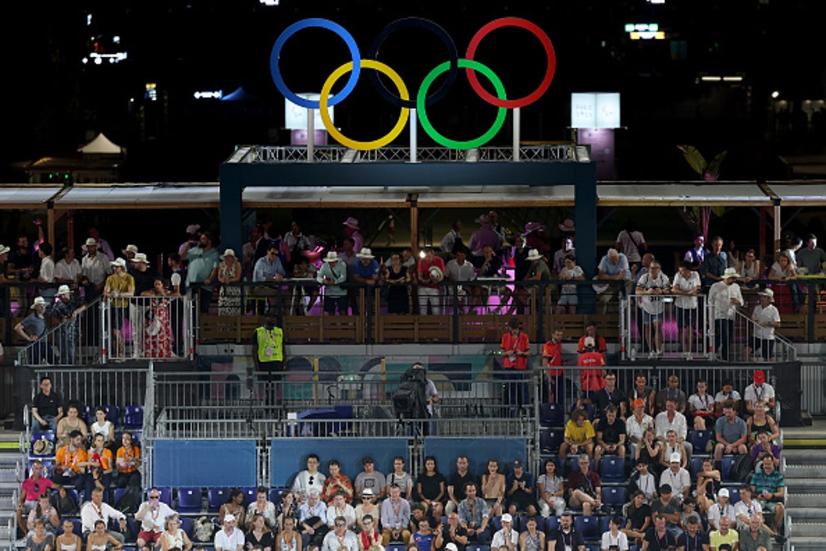 From pin trading to biting medals: The fun Olympic traditions athletes participate in during the Games