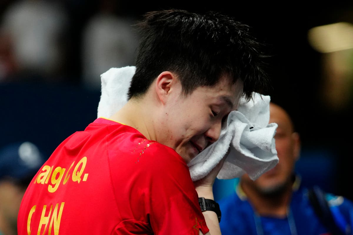 Photographer breaks Chinese table tennis star&rsquo;s paddle to spark major Olympic upset