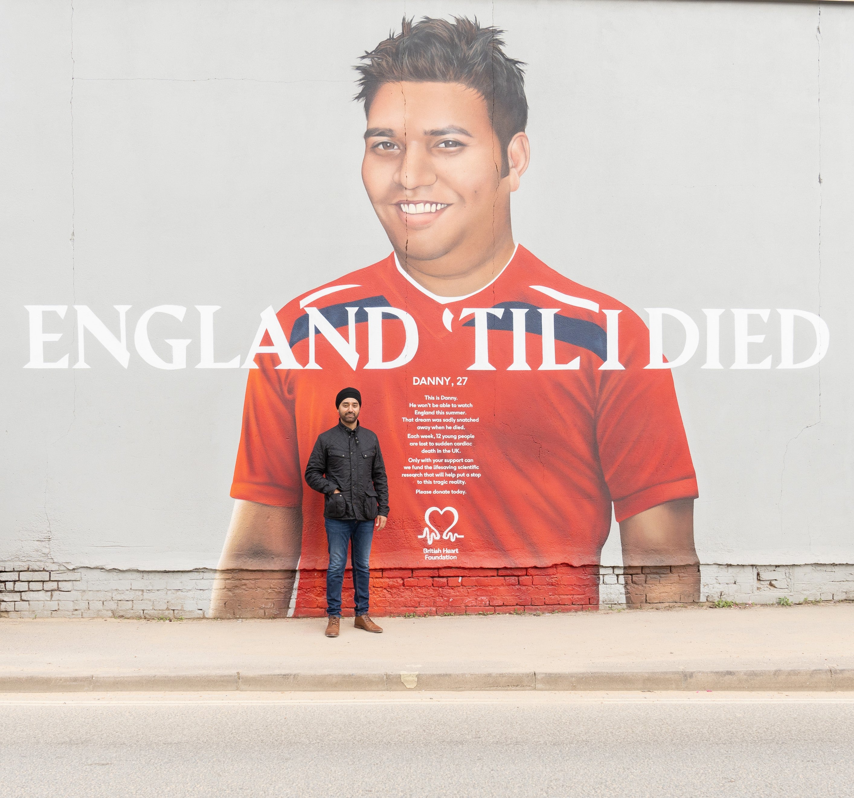 Bhadur at the mural of his brother Danny in Southampton