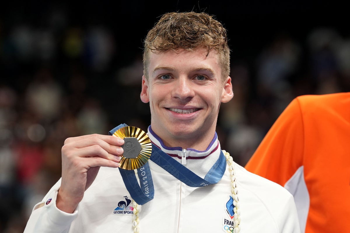 Leon Marchand is toast of Paris with astonishing Olympic double in the pool