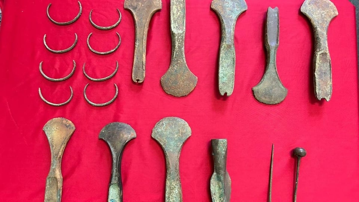 Archaeologists find 3,600-year-old stash of buried weapons and jewellery in Czech Republic