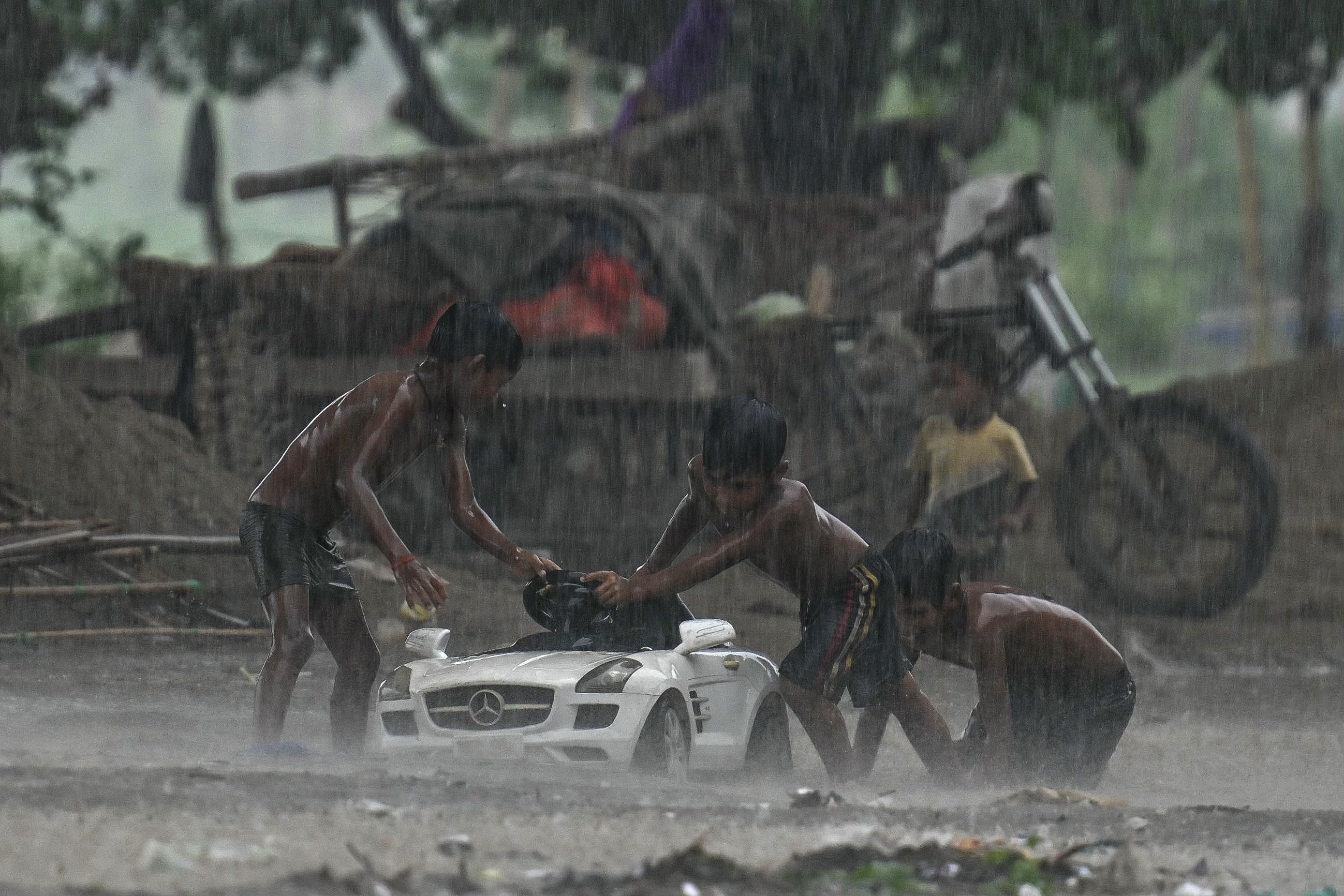 File: Children play in heavy rain in New Delhi on July 9, 2024