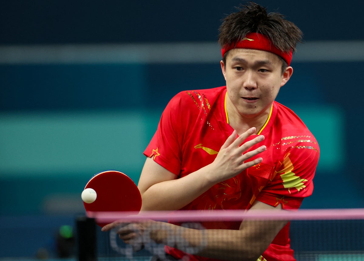 Photographers break Chinese table tennis star’s paddle to spark major Olympic upset