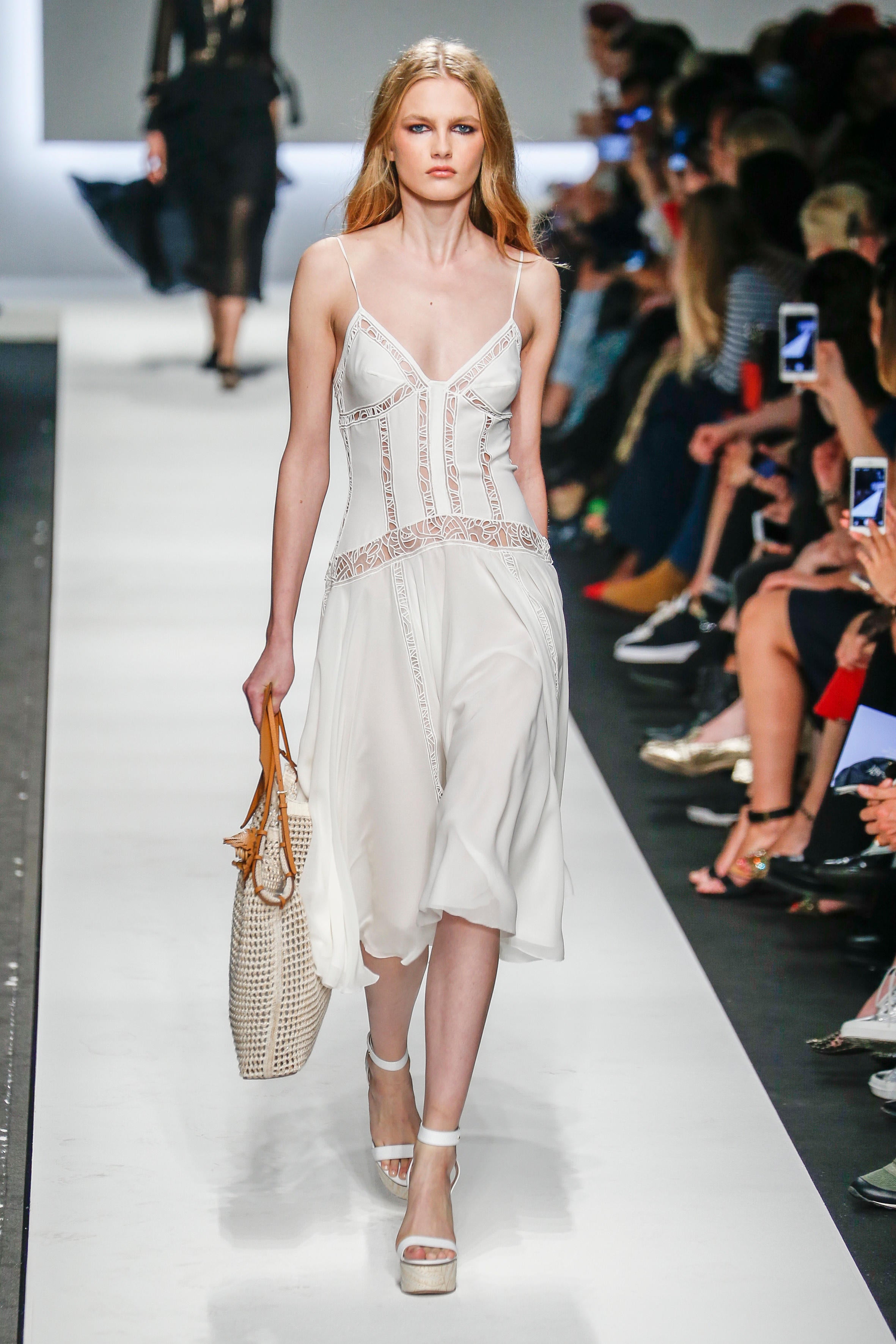 Flowing white frills pervaded the runways at Milan Fashion Week Spring/Summer (Alamy/PA)