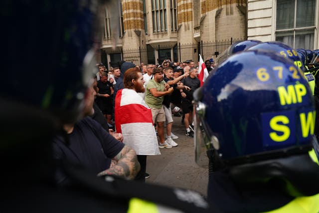 A demonstration outside Downing Street descended into violence as protesters threw bottles at police officers on Wednesday (Jordan Pettitt/PA)