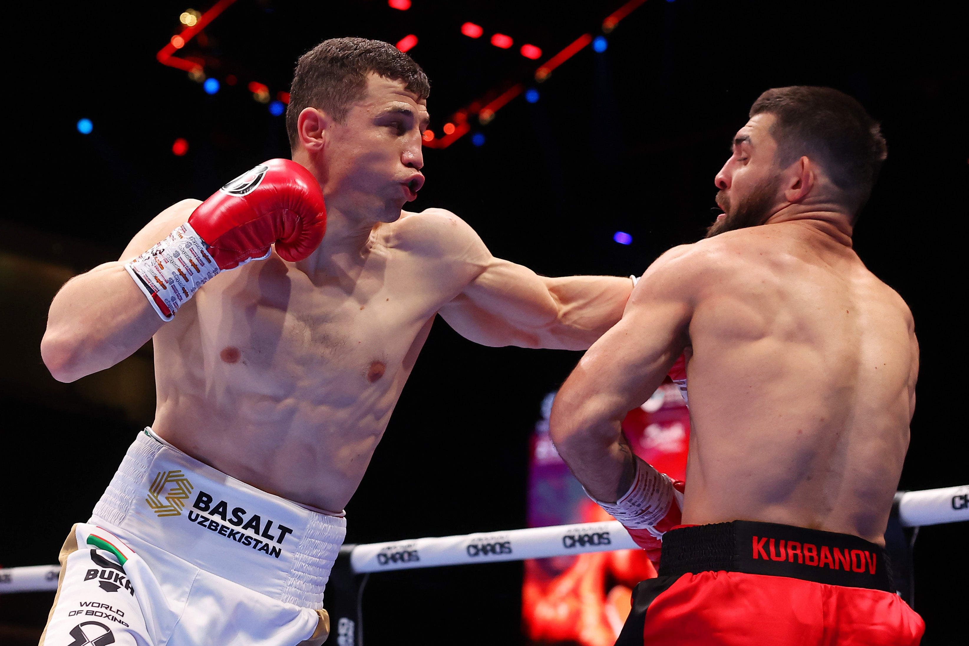 Israil Madrimov (left) en route to stopping Magomed Kurbanov in March