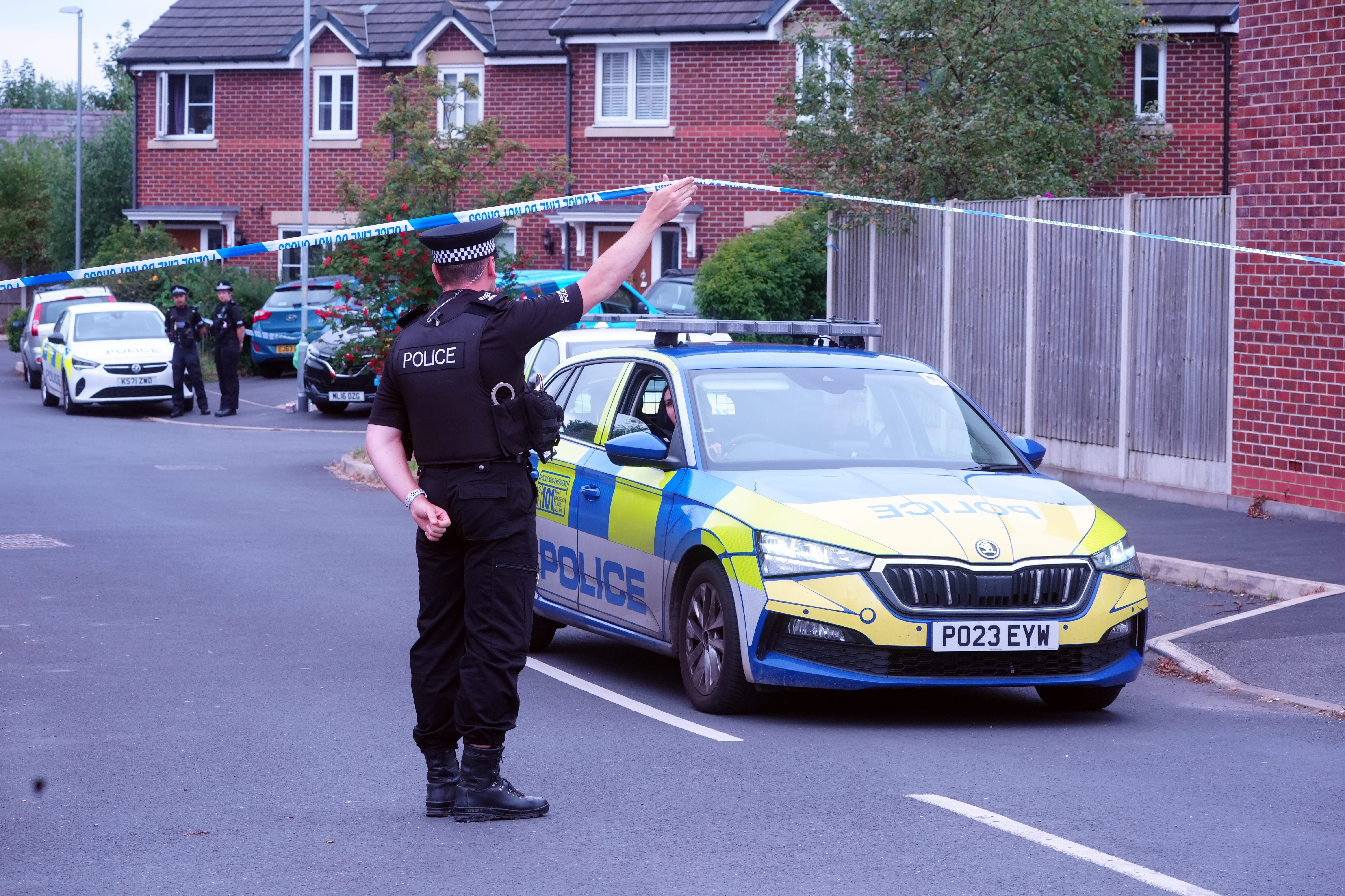 Emergency services at the home of 17-year-old Axel Rudakubana in Old School Close, Banks, near Southport (Owen Humphreys/PA)